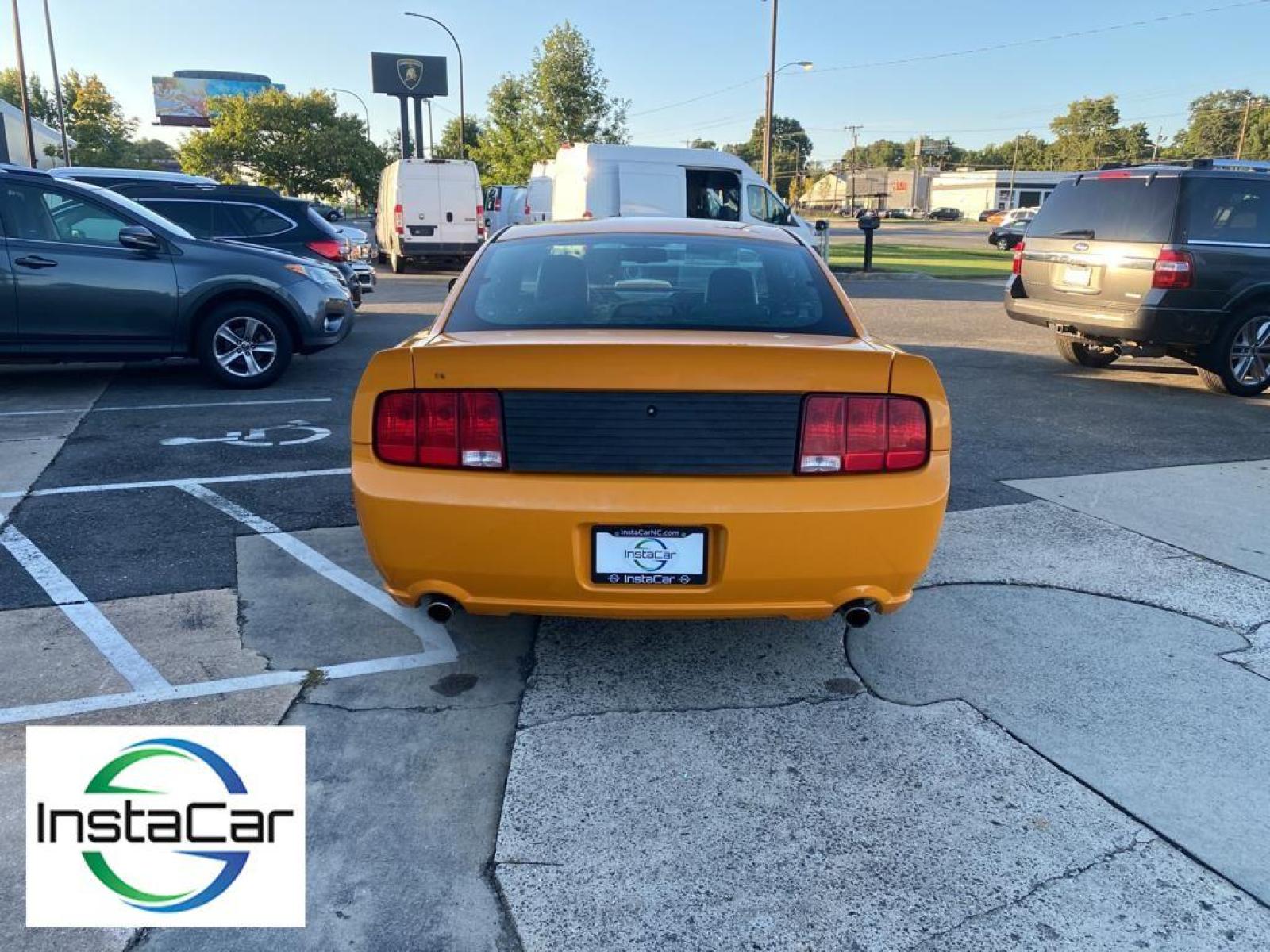2007 Grabber Orange Clearcoat Metallic /Dark Charcoal Ford Mustang GT Premium (1ZVFT82H075) with an V8, 4.6L engine, 5-speed manual transmission, located at 3147 E Independence Blvd, Charlotte, NC, 28205, 35.200268, -80.773651 - <b>Equipment</b><br>The satellite radio system in this model gives you access to hundreds of nation-wide radio stations with a clear digital signal. Enjoy your music even more with the premium sound system in this unit. The leather seats in this vehicle are a must for buyers looking for comfort, du - Photo #11