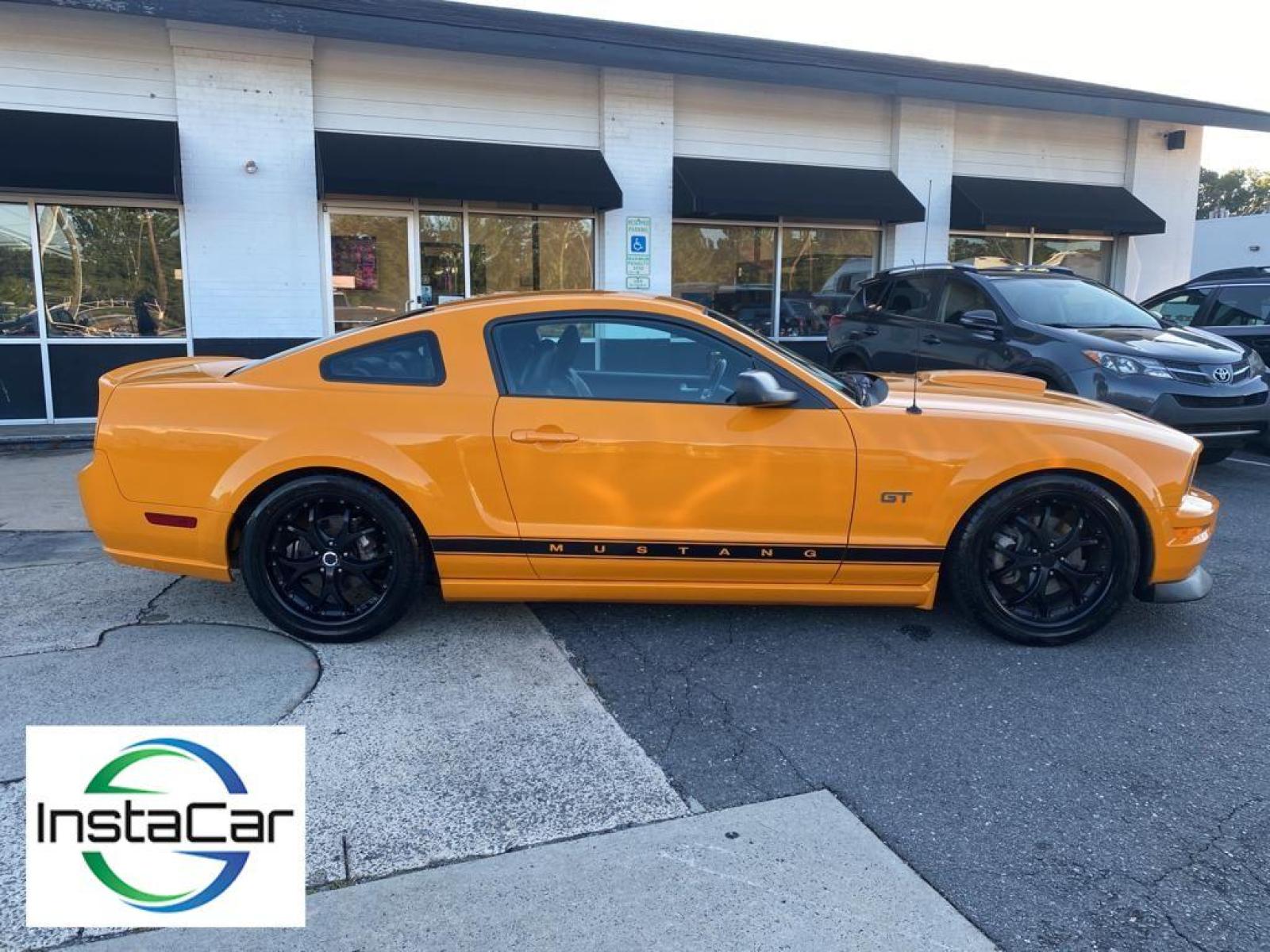 2007 Grabber Orange Clearcoat Metallic /Dark Charcoal Ford Mustang GT Premium (1ZVFT82H075) with an V8, 4.6L engine, 5-speed manual transmission, located at 3147 E Independence Blvd, Charlotte, NC, 28205, 35.200268, -80.773651 - <b>Equipment</b><br>The satellite radio system in this model gives you access to hundreds of nation-wide radio stations with a clear digital signal. Enjoy your music even more with the premium sound system in this unit. The leather seats in this vehicle are a must for buyers looking for comfort, du - Photo #13