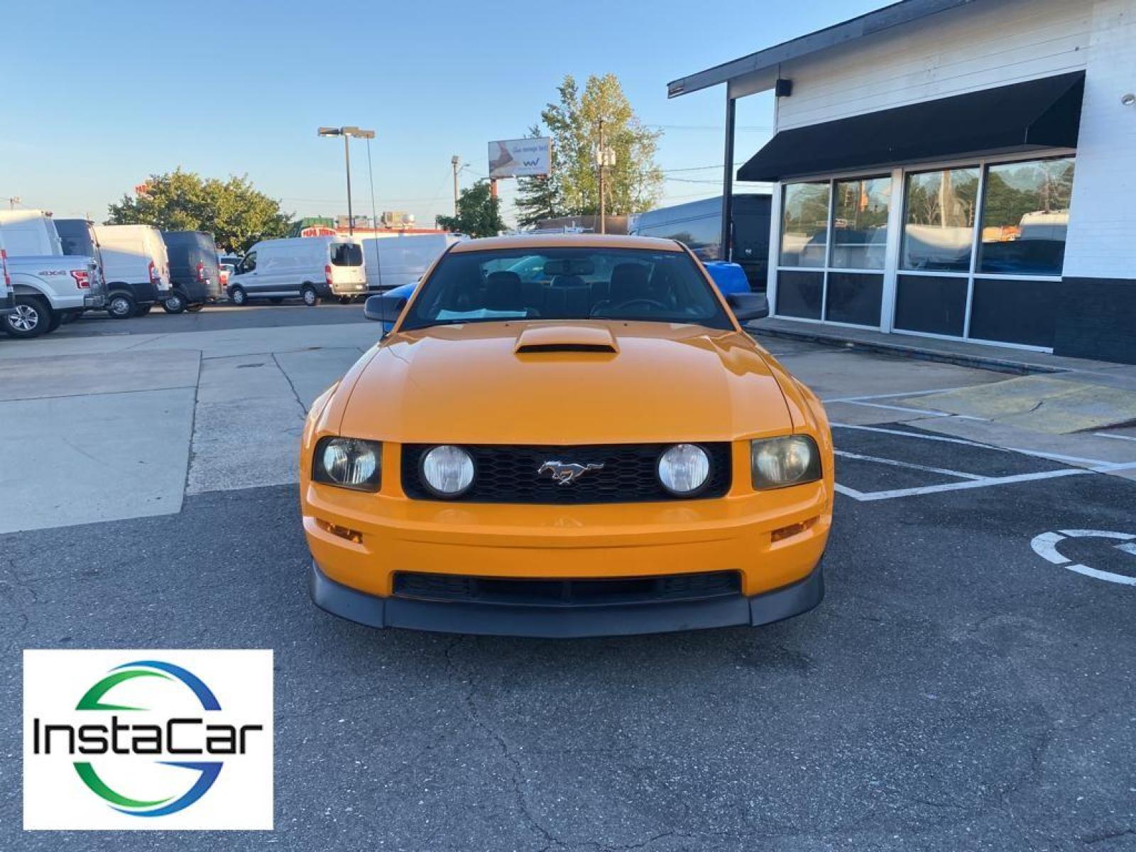 2007 Grabber Orange Clearcoat Metallic /Dark Charcoal Ford Mustang GT Premium (1ZVFT82H075) with an V8, 4.6L engine, 5-speed manual transmission, located at 3147 E Independence Blvd, Charlotte, NC, 28205, 35.200268, -80.773651 - <b>Equipment</b><br>The satellite radio system in this model gives you access to hundreds of nation-wide radio stations with a clear digital signal. Enjoy your music even more with the premium sound system in this unit. The leather seats in this vehicle are a must for buyers looking for comfort, du - Photo #7