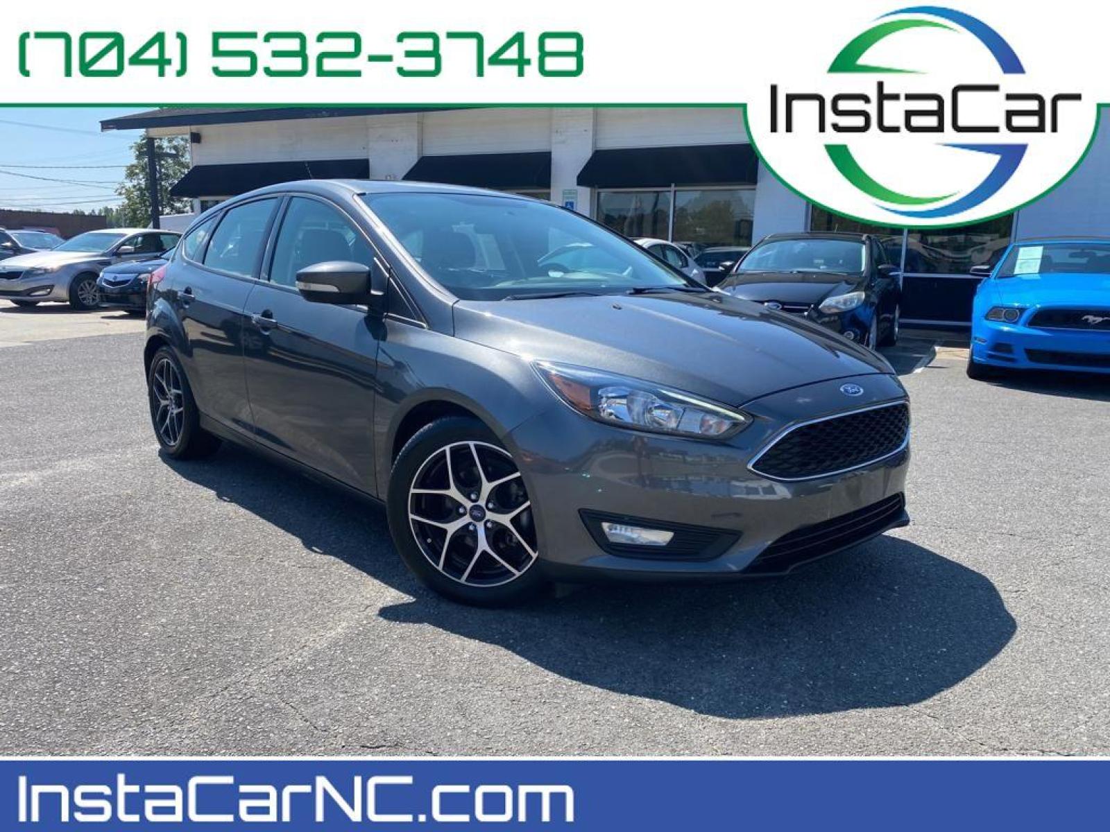 2017 Magnetic Metallic /Charcoal Black Ford Focus SEL (1FADP3M22HL) with an L4, 2.0L engine, 6-speed auto-shift manual transmission, located at 3147 E Independence Blvd, Charlotte, NC, 28205, 35.200268, -80.773651 - <b>Equipment</b><br>You'll never again be lost in a crowded city or a country region with the navigation system on this unit. Protect this Ford Focus from unwanted accidents with a cutting edge backup camera system. The Ford Focus has a premium sound system installed. The state of the art park assi - Photo #0
