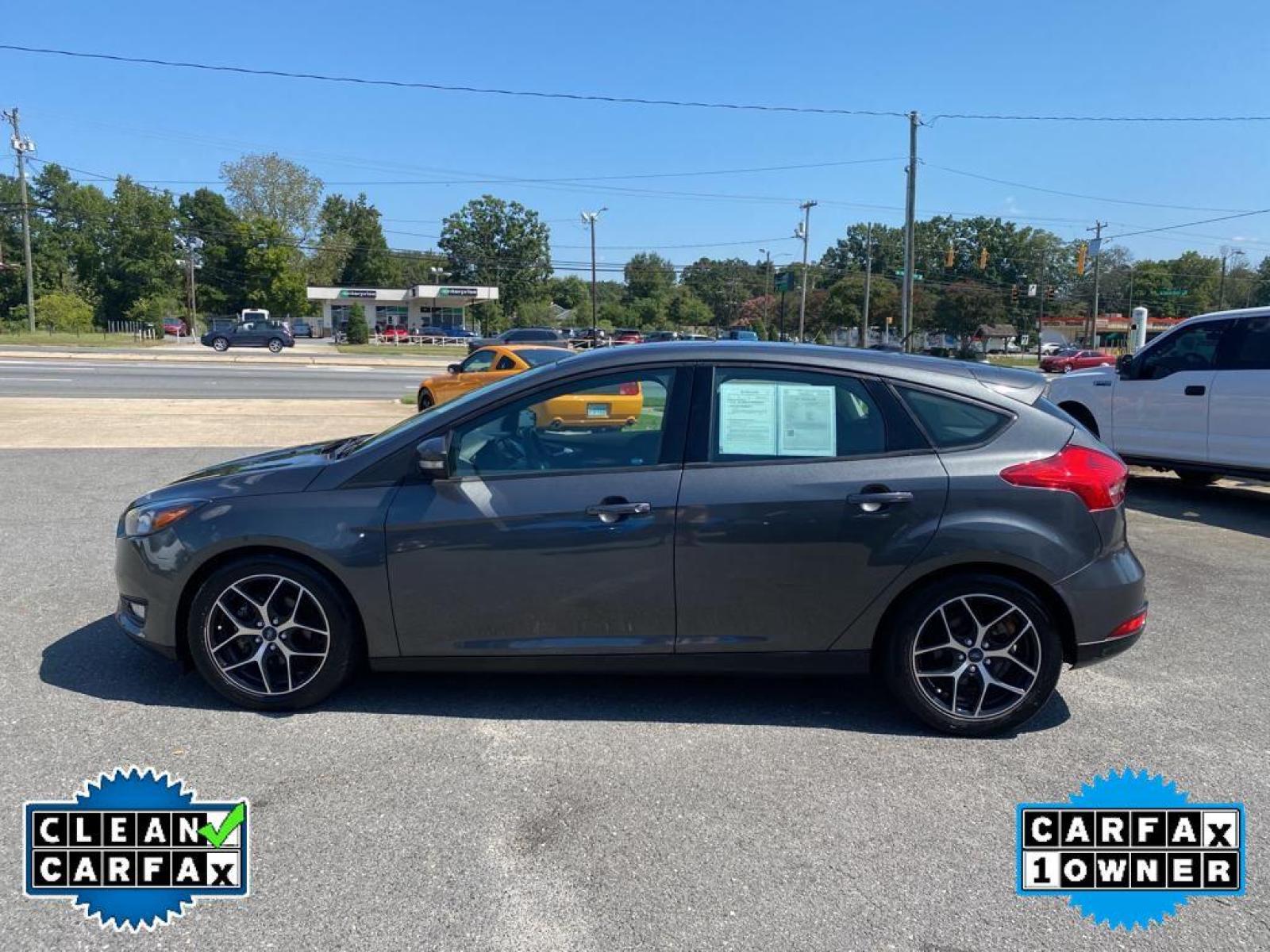 2017 Magnetic Metallic /Charcoal Black Ford Focus SEL (1FADP3M22HL) with an L4, 2.0L engine, 6-speed auto-shift manual transmission, located at 3147 E Independence Blvd, Charlotte, NC, 28205, 35.200268, -80.773651 - <b>Equipment</b><br>You'll never again be lost in a crowded city or a country region with the navigation system on this unit. Protect this Ford Focus from unwanted accidents with a cutting edge backup camera system. The Ford Focus has a premium sound system installed. The state of the art park assi - Photo #9