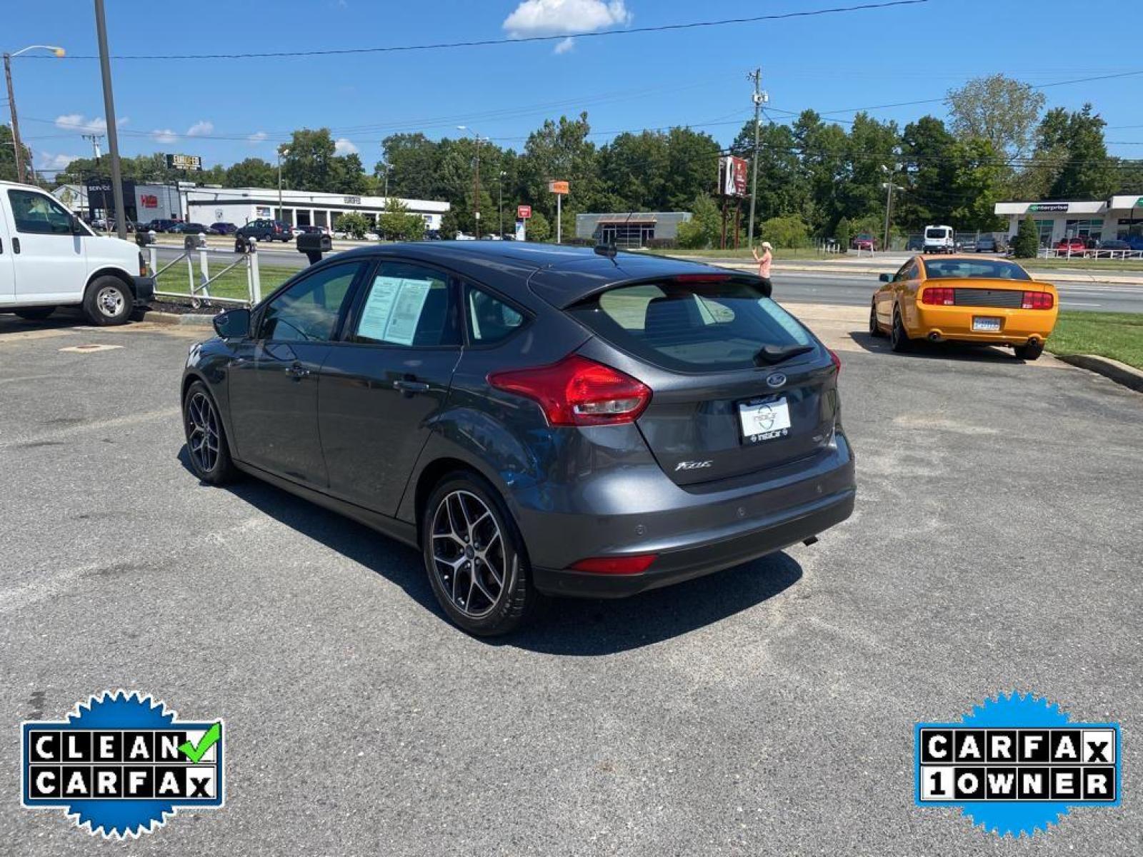 2017 Magnetic Metallic /Charcoal Black Ford Focus SEL (1FADP3M22HL) with an L4, 2.0L engine, 6-speed auto-shift manual transmission, located at 3147 E Independence Blvd, Charlotte, NC, 28205, 35.200268, -80.773651 - <b>Equipment</b><br>You'll never again be lost in a crowded city or a country region with the navigation system on this unit. Protect this Ford Focus from unwanted accidents with a cutting edge backup camera system. The Ford Focus has a premium sound system installed. The state of the art park assi - Photo #10