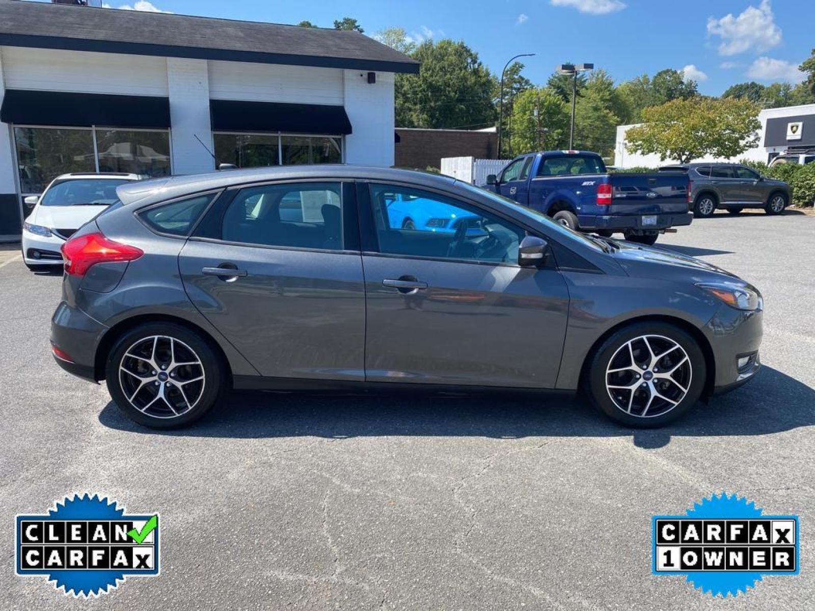 2017 Magnetic Metallic /Charcoal Black Ford Focus SEL (1FADP3M22HL) with an L4, 2.0L engine, 6-speed auto-shift manual transmission, located at 3147 E Independence Blvd, Charlotte, NC, 28205, 35.200268, -80.773651 - <b>Equipment</b><br>You'll never again be lost in a crowded city or a country region with the navigation system on this unit. Protect this Ford Focus from unwanted accidents with a cutting edge backup camera system. The Ford Focus has a premium sound system installed. The state of the art park assi - Photo #13