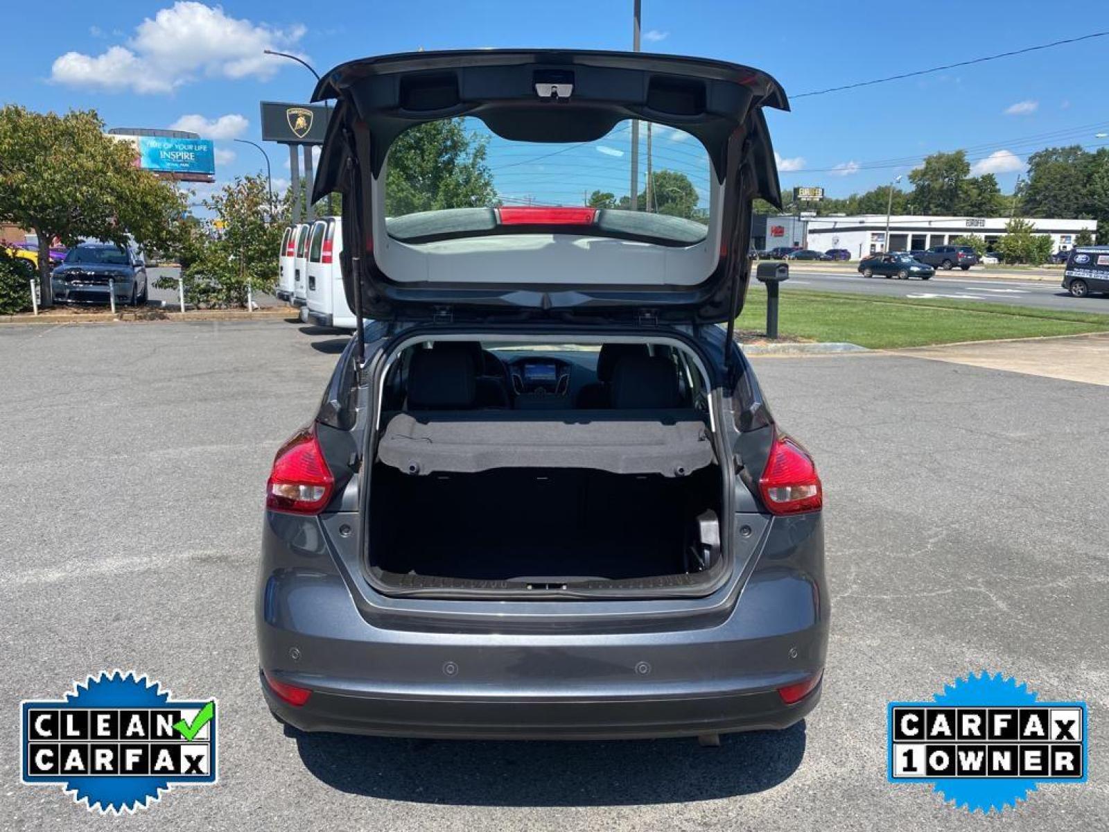 2017 Magnetic Metallic /Charcoal Black Ford Focus SEL (1FADP3M22HL) with an L4, 2.0L engine, 6-speed auto-shift manual transmission, located at 3147 E Independence Blvd, Charlotte, NC, 28205, 35.200268, -80.773651 - <b>Equipment</b><br>You'll never again be lost in a crowded city or a country region with the navigation system on this unit. Protect this Ford Focus from unwanted accidents with a cutting edge backup camera system. The Ford Focus has a premium sound system installed. The state of the art park assi - Photo #32