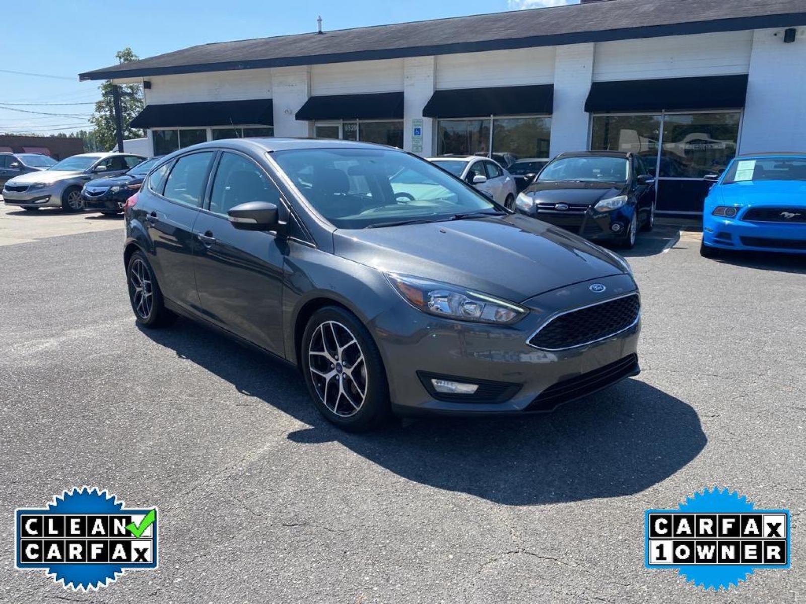 2017 Magnetic Metallic /Charcoal Black Ford Focus SEL (1FADP3M22HL) with an L4, 2.0L engine, 6-speed auto-shift manual transmission, located at 3147 E Independence Blvd, Charlotte, NC, 28205, 35.200268, -80.773651 - <b>Equipment</b><br>You'll never again be lost in a crowded city or a country region with the navigation system on this unit. Protect this Ford Focus from unwanted accidents with a cutting edge backup camera system. The Ford Focus has a premium sound system installed. The state of the art park assi - Photo #6
