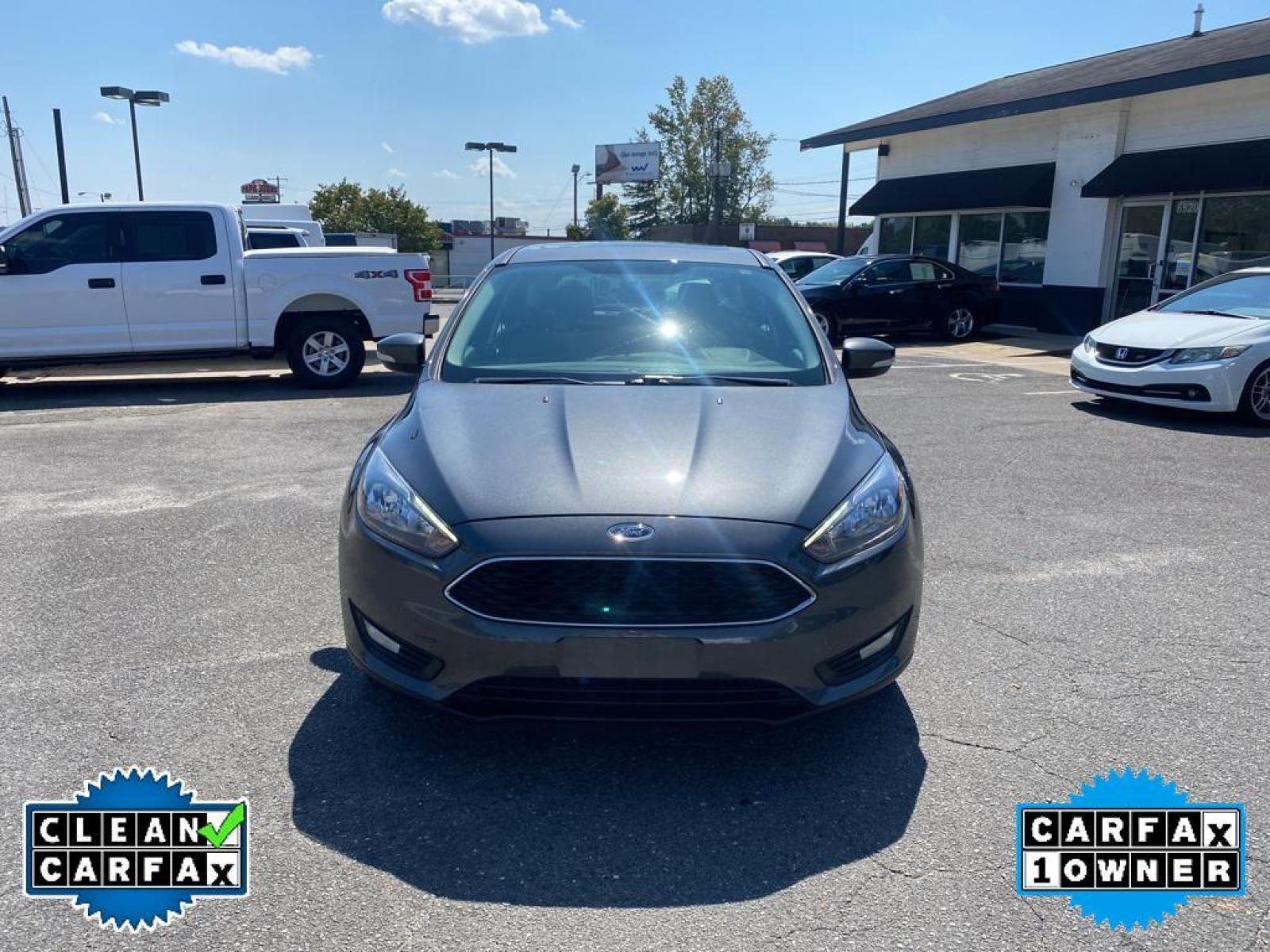 2017 Magnetic Metallic /Charcoal Black Ford Focus SEL (1FADP3M22HL) with an L4, 2.0L engine, 6-speed auto-shift manual transmission, located at 3147 E Independence Blvd, Charlotte, NC, 28205, 35.200268, -80.773651 - <b>Equipment</b><br>You'll never again be lost in a crowded city or a country region with the navigation system on this unit. Protect this Ford Focus from unwanted accidents with a cutting edge backup camera system. The Ford Focus has a premium sound system installed. The state of the art park assi - Photo #7