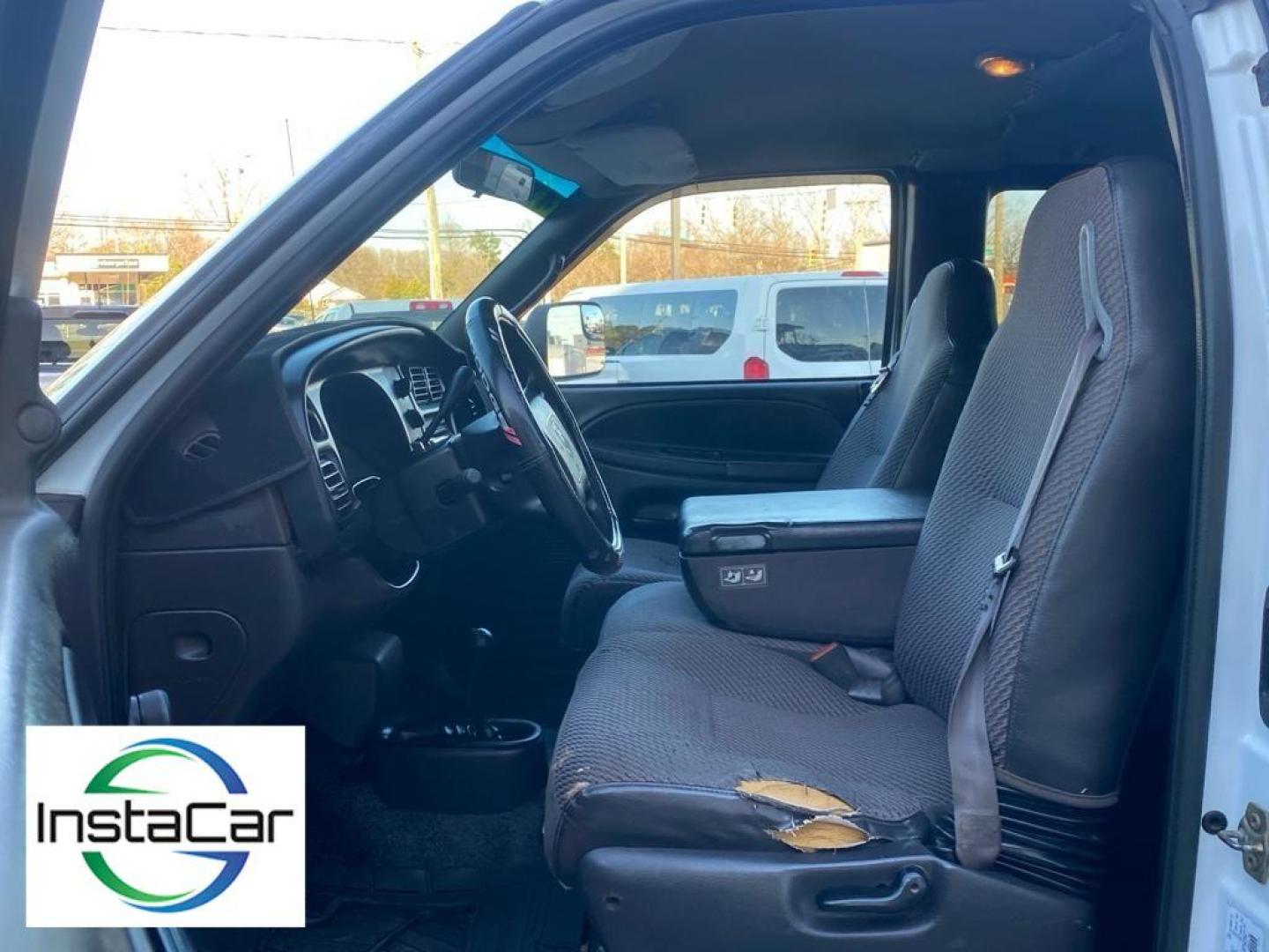 2001 white Dodge Ram Pickup Base (1B7KF23Z31J) with an V8, 5.9L engine, Automatic transmission, located at 3147 E Independence Blvd, Charlotte, NC, 28205, 35.200268, -80.773651 - Discover the robust capabilities of the 2001 Dodge Ram Pickup 2500 Base, a versatile workhorse designed to tackle both everyday tasks and demanding jobs. Equipped with a powerful V8, 5.9L engine, this vehicle delivers impressive performance and reliability, ensuring you have the strength needed for - Photo#13