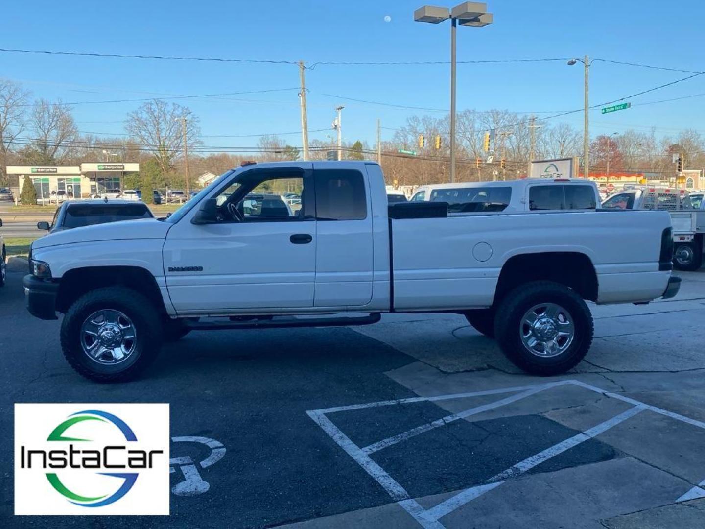 2001 white Dodge Ram Pickup Base (1B7KF23Z31J) with an V8, 5.9L engine, Automatic transmission, located at 3147 E Independence Blvd, Charlotte, NC, 28205, 35.200268, -80.773651 - Discover the robust capabilities of the 2001 Dodge Ram Pickup 2500 Base, a versatile workhorse designed to tackle both everyday tasks and demanding jobs. Equipped with a powerful V8, 5.9L engine, this vehicle delivers impressive performance and reliability, ensuring you have the strength needed for - Photo#4