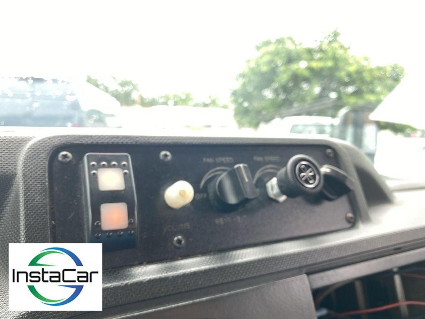 2019 Oxford White /Medium Flint Ford E-450 Super Duty Base (1FDFE4FS8KD) with an V10, 6.8L (415 CID) engine, 6-speed automatic transmission, located at 3147 E Independence Blvd, Charlotte, NC, 28205, 35.200268, -80.773651 - <b>Equipment</b><br>The vehicle shines with clean polished lines coated with an elegant white finish. This 2019 Ford E-450 Super Duty E-Series has a V10, 6.8L (415 CID) high output engine. This unit is rear wheel drive. Maintaining a stable interior temperature in this 1 1/2 ton van is easy with the - Photo#2