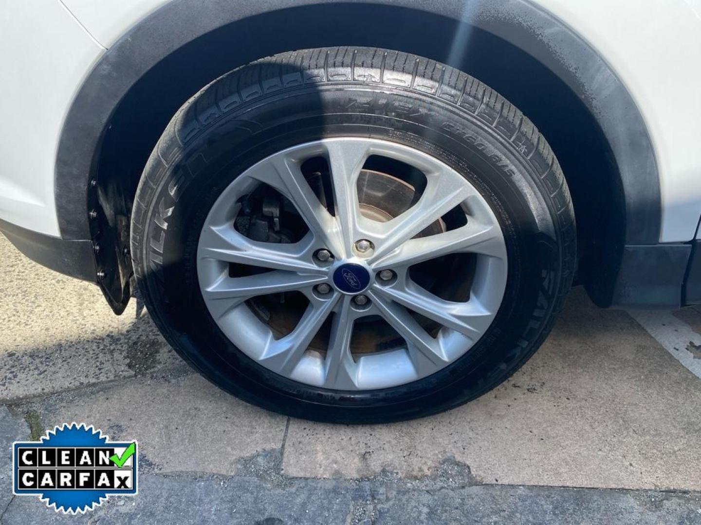 2018 Oxford White /Charcoal Black Ford Escape SE (1FMCU0GD3JU) with an 4 Cyl, 1.5L engine, 6-speed automatic transmission, located at 6520 E. Independence Blvd., Charlotte, NC, 28212, 35.146019, -80.723465 - Photo#14