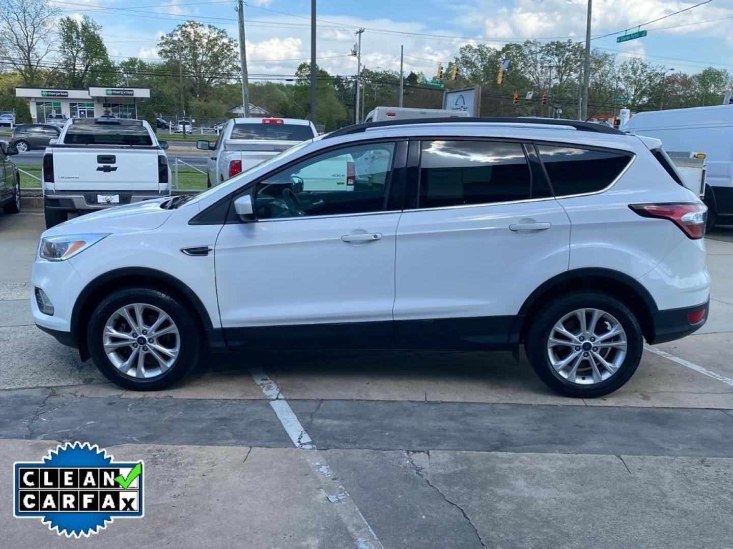 2018 Oxford White /Charcoal Black Ford Escape SE (1FMCU0GD3JU) with an 4 Cyl, 1.5L engine, 6-speed automatic transmission, located at 6520 E. Independence Blvd., Charlotte, NC, 28212, 35.146019, -80.723465 - Photo#7