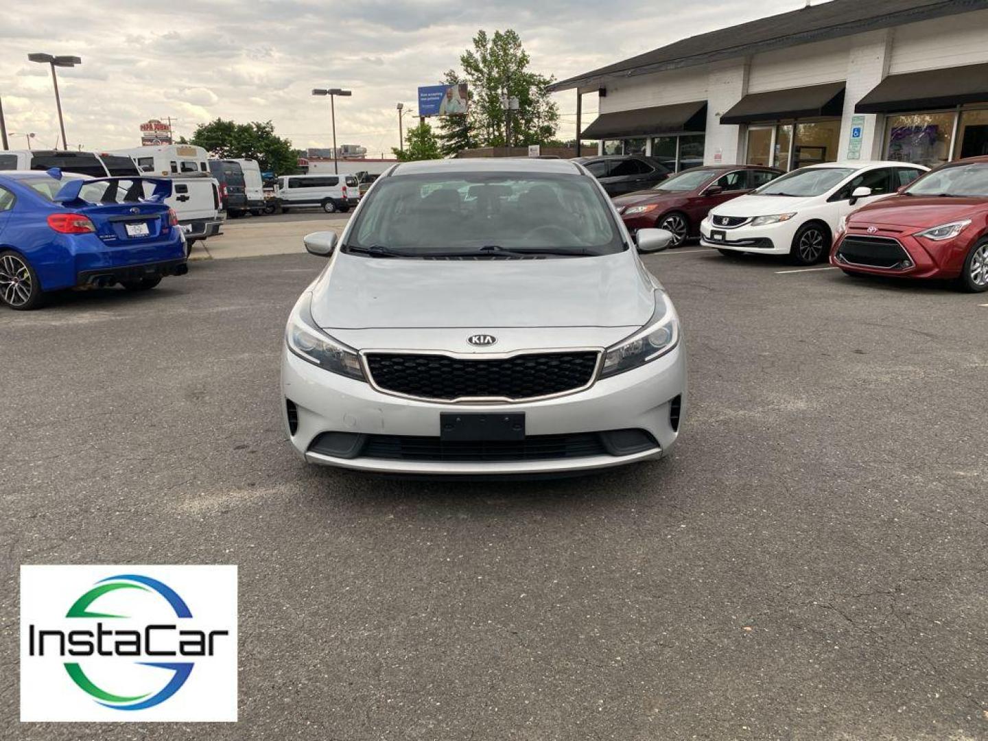 2017 Silky Silver /Black Kia Forte LX (3KPFK4A76HE) with an 4 Cyl, 2.0L engine, 6-speed automatic transmission, located at 6520 E. Independence Blvd., Charlotte, NC, 28212, 35.146019, -80.723465 - The satellite radio system in the vehicle gives you access to hundreds of nation-wide radio stations with a clear digital signal. The Kia Forte features a hands-free Bluetooth phone system. with XM/Sirus Satellite Radio you are no longer restricted by poor quality local radio stations while drivin - Photo#6