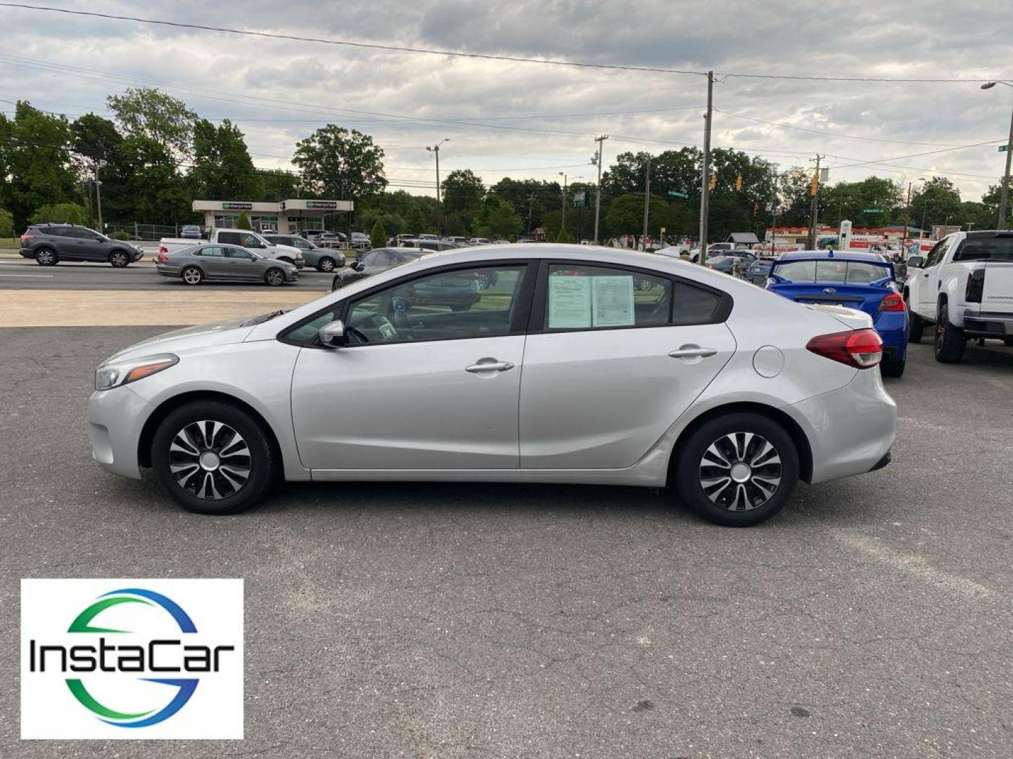 2017 Silky Silver /Black Kia Forte LX (3KPFK4A76HE) with an 4 Cyl, 2.0L engine, 6-speed automatic transmission, located at 6520 E. Independence Blvd., Charlotte, NC, 28212, 35.146019, -80.723465 - The satellite radio system in the vehicle gives you access to hundreds of nation-wide radio stations with a clear digital signal. The Kia Forte features a hands-free Bluetooth phone system. with XM/Sirus Satellite Radio you are no longer restricted by poor quality local radio stations while drivin - Photo#8