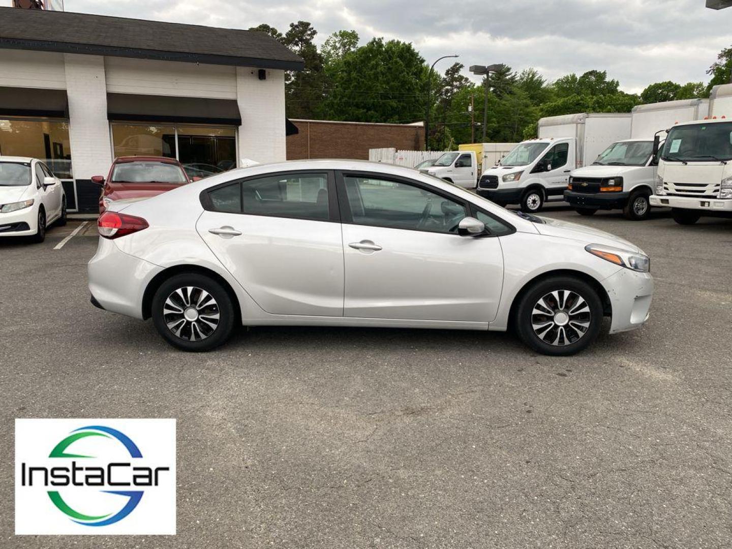 2017 Silky Silver /Black Kia Forte LX (3KPFK4A76HE) with an 4 Cyl, 2.0L engine, 6-speed automatic transmission, located at 6520 E. Independence Blvd., Charlotte, NC, 28212, 35.146019, -80.723465 - The satellite radio system in the vehicle gives you access to hundreds of nation-wide radio stations with a clear digital signal. The Kia Forte features a hands-free Bluetooth phone system. with XM/Sirus Satellite Radio you are no longer restricted by poor quality local radio stations while drivin - Photo#12
