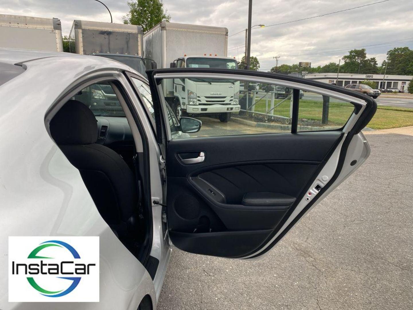 2017 Silky Silver /Black Kia Forte LX (3KPFK4A76HE) with an 4 Cyl, 2.0L engine, 6-speed automatic transmission, located at 6520 E. Independence Blvd., Charlotte, NC, 28212, 35.146019, -80.723465 - The satellite radio system in the vehicle gives you access to hundreds of nation-wide radio stations with a clear digital signal. The Kia Forte features a hands-free Bluetooth phone system. with XM/Sirus Satellite Radio you are no longer restricted by poor quality local radio stations while drivin - Photo#20