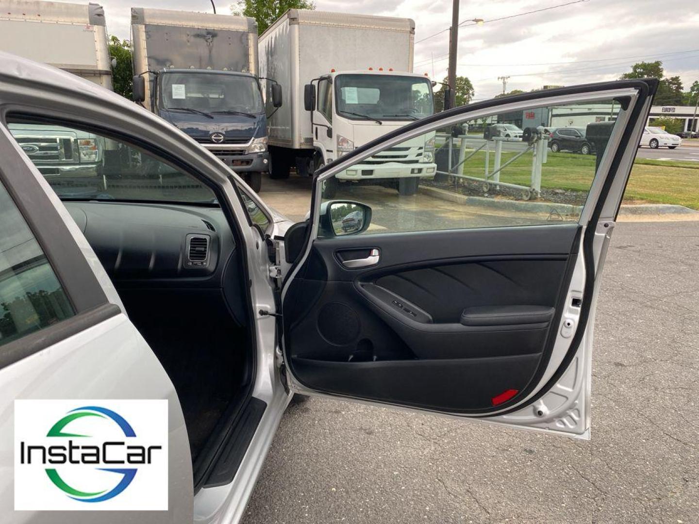 2017 Silky Silver /Black Kia Forte LX (3KPFK4A76HE) with an 4 Cyl, 2.0L engine, 6-speed automatic transmission, located at 6520 E. Independence Blvd., Charlotte, NC, 28212, 35.146019, -80.723465 - The satellite radio system in the vehicle gives you access to hundreds of nation-wide radio stations with a clear digital signal. The Kia Forte features a hands-free Bluetooth phone system. with XM/Sirus Satellite Radio you are no longer restricted by poor quality local radio stations while drivin - Photo#21