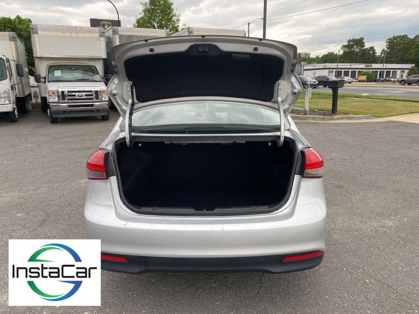 2017 Silky Silver /Black Kia Forte LX (3KPFK4A76HE) with an 4 Cyl, 2.0L engine, 6-speed automatic transmission, located at 6520 E. Independence Blvd., Charlotte, NC, 28212, 35.146019, -80.723465 - The satellite radio system in the vehicle gives you access to hundreds of nation-wide radio stations with a clear digital signal. The Kia Forte features a hands-free Bluetooth phone system. with XM/Sirus Satellite Radio you are no longer restricted by poor quality local radio stations while drivin - Photo#26