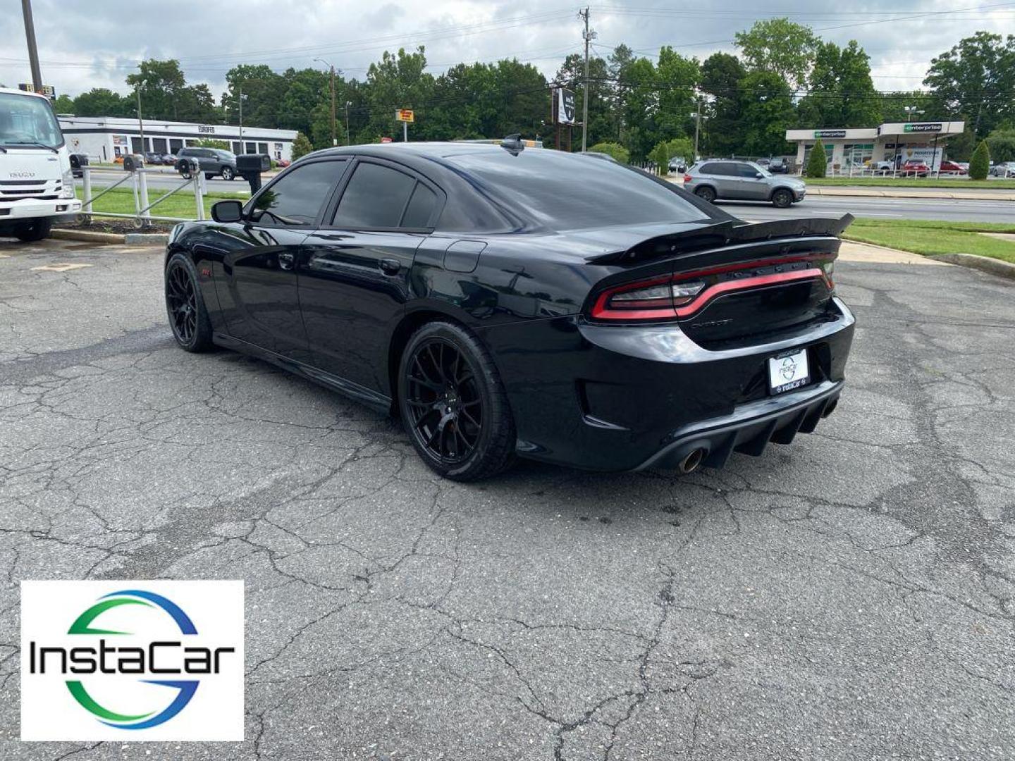 2015 Pitch Black /Black Dodge Charger SRT 392 (2C3CDXEJ2FH) with an V8, 6.4L engine, 8-speed automatic transmission, located at 3147 E Independence Blvd, Charlotte, NC, 28205, 35.200268, -80.773651 - Photo#11