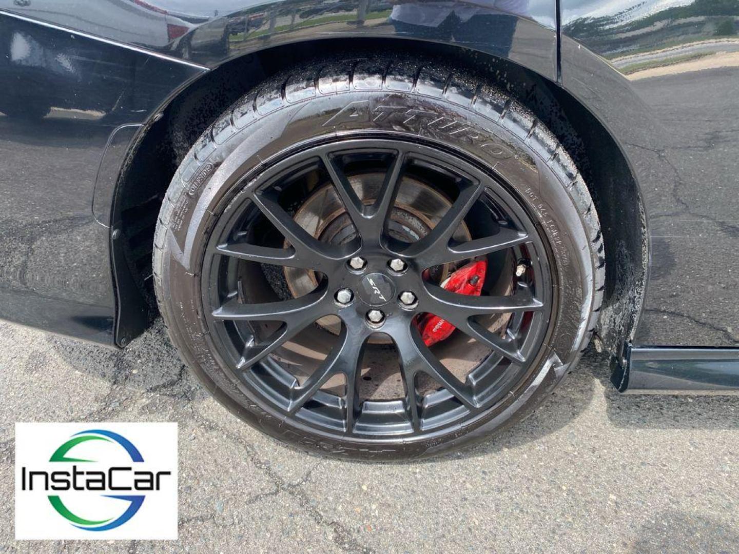 2015 Pitch Black /Black Dodge Charger SRT 392 (2C3CDXEJ2FH) with an V8, 6.4L engine, 8-speed automatic transmission, located at 3147 E Independence Blvd, Charlotte, NC, 28205, 35.200268, -80.773651 - Photo#15