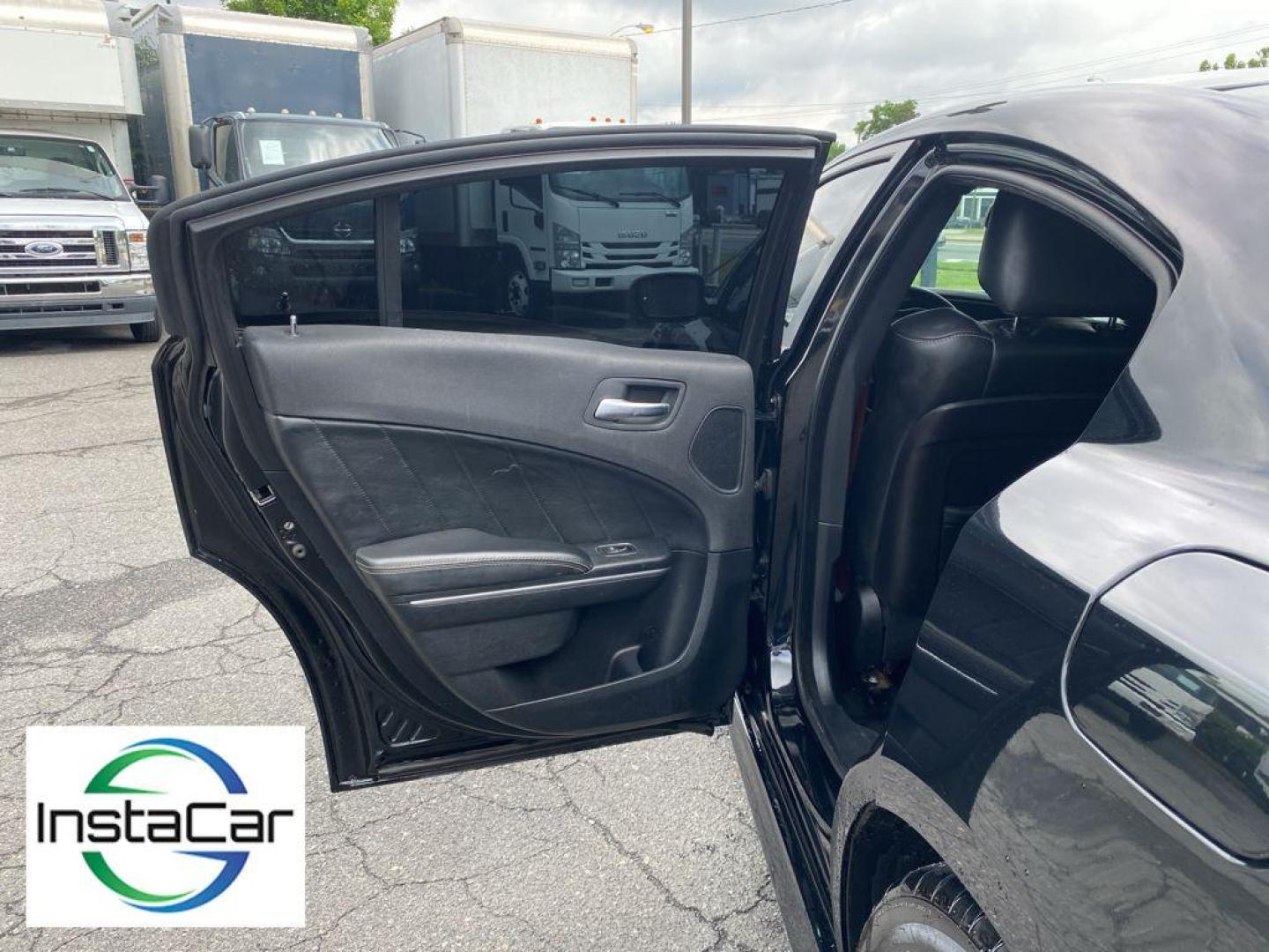 2015 Pitch Black /Black Dodge Charger SRT 392 (2C3CDXEJ2FH) with an V8, 6.4L engine, 8-speed automatic transmission, located at 3147 E Independence Blvd, Charlotte, NC, 28205, 35.200268, -80.773651 - Photo#21