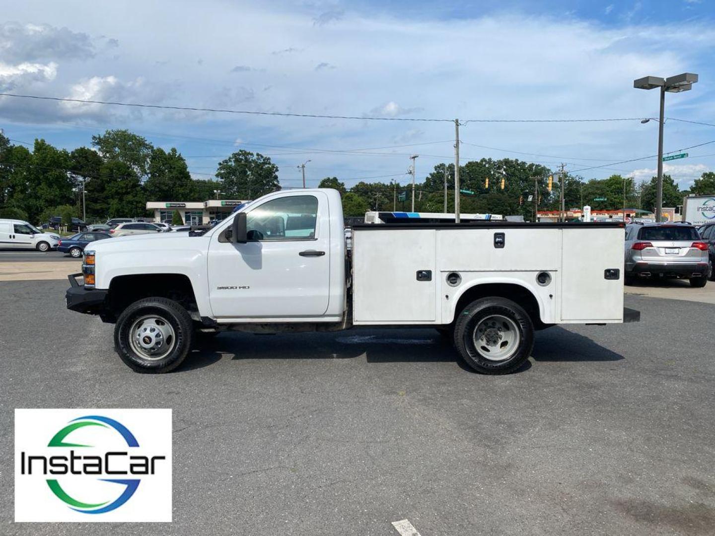 2017 Summit White /Dark Ash/Jet Black Chevrolet Silverado Work Truck (1GB3CYCG4HZ) with an V8, 6.0L engine, 6-speed automatic transmission, located at 6520 E. Independence Blvd., Charlotte, NC, 28212, 35.146019, -80.723465 - Photo#7