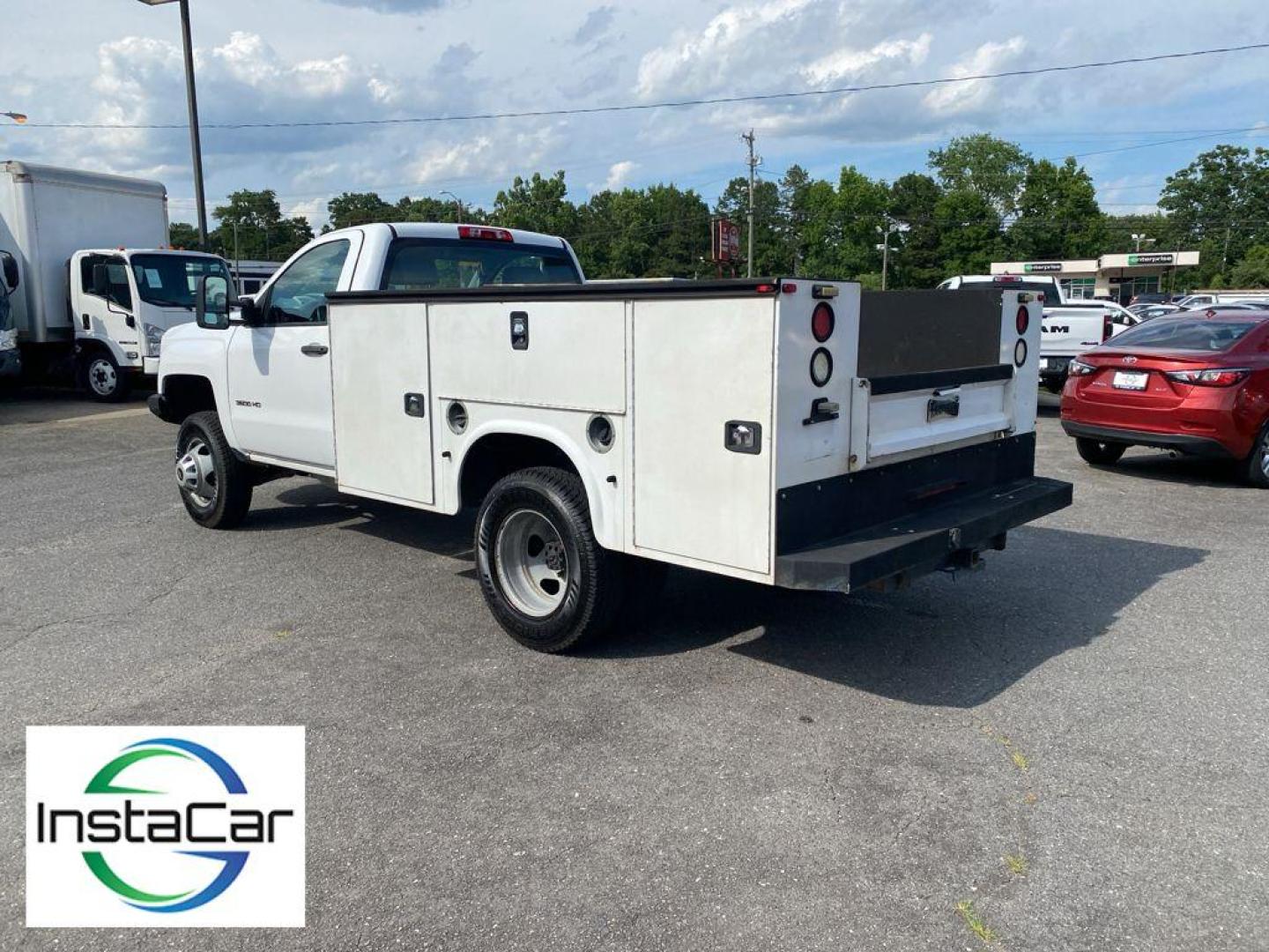 2017 Summit White /Dark Ash/Jet Black Chevrolet Silverado Work Truck (1GB3CYCG4HZ) with an V8, 6.0L engine, 6-speed automatic transmission, located at 6520 E. Independence Blvd., Charlotte, NC, 28212, 35.146019, -80.723465 - Photo#8