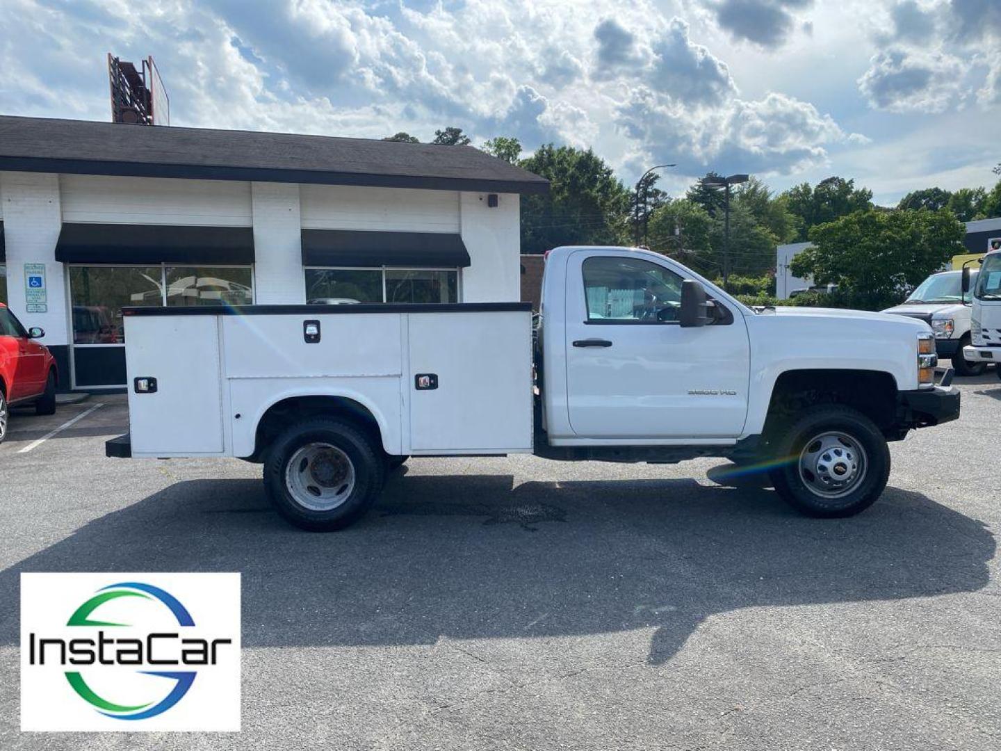 2017 Summit White /Dark Ash/Jet Black Chevrolet Silverado Work Truck (1GB3CYCG4HZ) with an V8, 6.0L engine, 6-speed automatic transmission, located at 6520 E. Independence Blvd., Charlotte, NC, 28212, 35.146019, -80.723465 - Photo#11