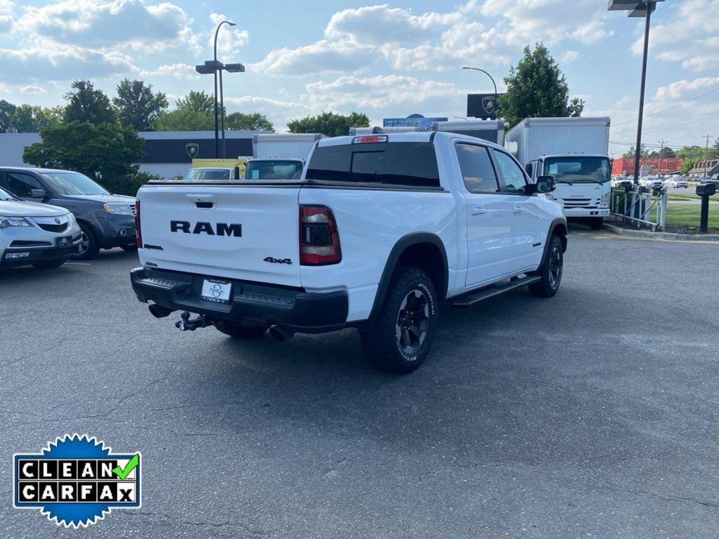 2020 Bright White Clearcoat /Black Ram 1500 Rebel (1C6SRFLT7LN) with an V8, 5.7L engine, 8-speed automatic transmission, located at 6520 E. Independence Blvd., Charlotte, NC, 28212, 35.146019, -80.723465 - Discover the power and versatility of the 2020 Ram 1500 Rebel, now available at our dealership. This robust truck is equipped with a 4WD system, ensuring you're ready for any terrain or weather conditions. Under the hood, you'll find a commanding V8, 5.7L engine, delivering the performance and relia - Photo#14