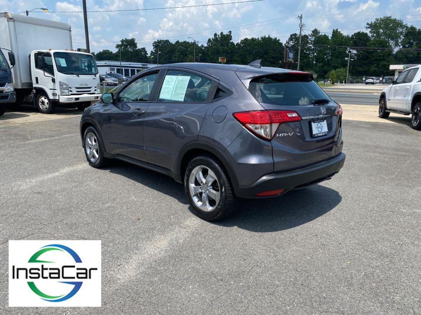 2021 Gray Honda HR-V LX (3CZRU5H30MM) with an 4 Cyl, 1.8L engine, CVT transmission, located at 6520 E. Independence Blvd., Charlotte, NC, 28212, 35.146019, -80.723465 - Discover the perfect blend of style, efficiency, and practicality with this pre-owned 2021 Honda HR-V LX. Designed for urban adventures and weekend getaways, this compact SUV offers a reliable and smooth driving experience with its 1.8L 4-cylinder engine. Known for its exceptional fuel economy, the - Photo#10