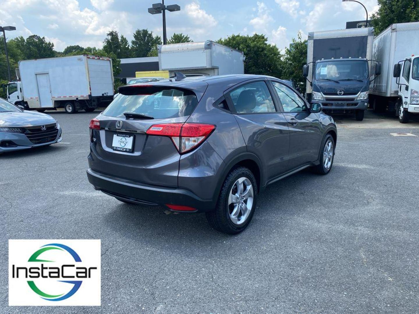 2021 Gray Honda HR-V LX (3CZRU5H30MM) with an 4 Cyl, 1.8L engine, CVT transmission, located at 6520 E. Independence Blvd., Charlotte, NC, 28212, 35.146019, -80.723465 - Discover the perfect blend of style, efficiency, and practicality with this pre-owned 2021 Honda HR-V LX. Designed for urban adventures and weekend getaways, this compact SUV offers a reliable and smooth driving experience with its 1.8L 4-cylinder engine. Known for its exceptional fuel economy, the - Photo#12