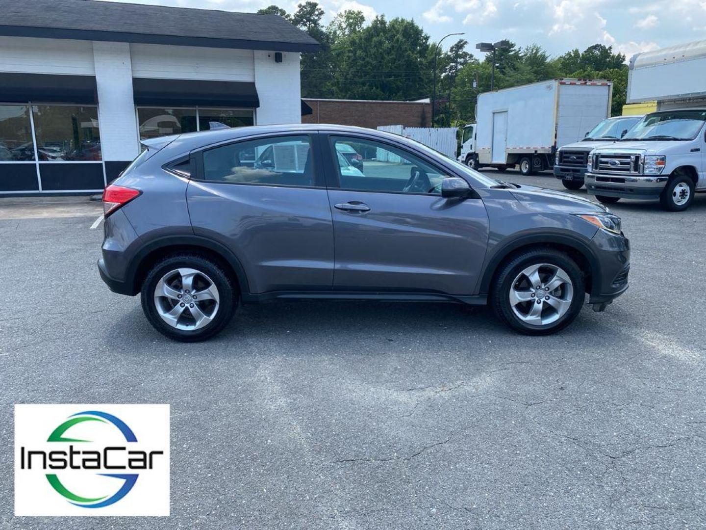 2021 Gray Honda HR-V LX (3CZRU5H30MM) with an 4 Cyl, 1.8L engine, CVT transmission, located at 6520 E. Independence Blvd., Charlotte, NC, 28212, 35.146019, -80.723465 - Discover the perfect blend of style, efficiency, and practicality with this pre-owned 2021 Honda HR-V LX. Designed for urban adventures and weekend getaways, this compact SUV offers a reliable and smooth driving experience with its 1.8L 4-cylinder engine. Known for its exceptional fuel economy, the - Photo#13
