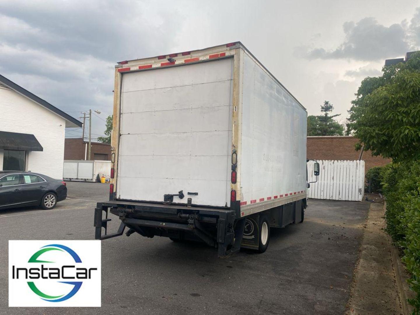 2009 white Isuzu NPR (4KLB4W1N49J) with an V8, 6.0L engine, Automatic transmission, located at 6520 E. Independence Blvd., Charlotte, NC, 28212, 35.146019, -80.723465 - Photo#6