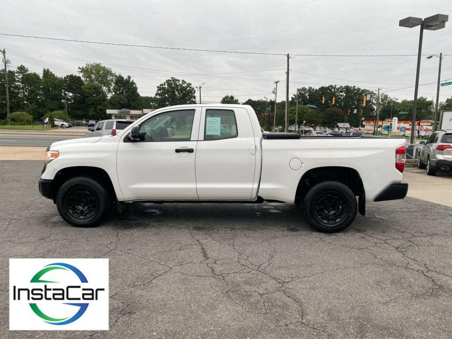 2017 Super White /Graphite Toyota Tundra SR (5TFUM5F16HX) with an V8, 4.6L engine, 6-speed automatic transmission, located at 6520 E. Independence Blvd., Charlotte, NC, 28212, 35.146019, -80.723465 - For sale: a robust 2017 Toyota Tundra equipped with 4WD and a powerful V8, 4.6L engineready to tackle any terrain with ease and reliability. This pre-owned gem combines strength with sophistication, making it an ideal choice for both work and play. <br><br>Inside, enjoy the convenience and safety of - Photo#8