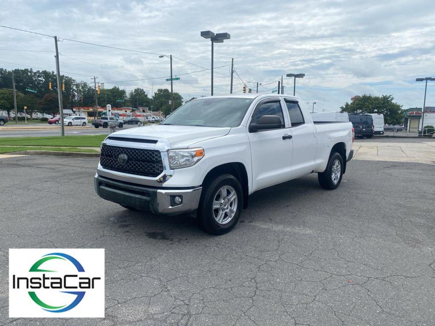 2018 Super White /Graphite Toyota Tundra SR (5TFRM5F1XJX) with an V8, 4.6L engine, 6-speed automatic transmission, located at 6520 E. Independence Blvd., Charlotte, NC, 28212, 35.146019, -80.723465 - Experience the perfect blend of power, reliability, and modern technology with this remarkable 2018 Toyota Tundra! A true workhorse on the road, this Toyota Tundra is powered by a robust V8, 4.6L engine that delivers impressive performance and towing capability, ensuring you conquer any challenge wi - Photo#8