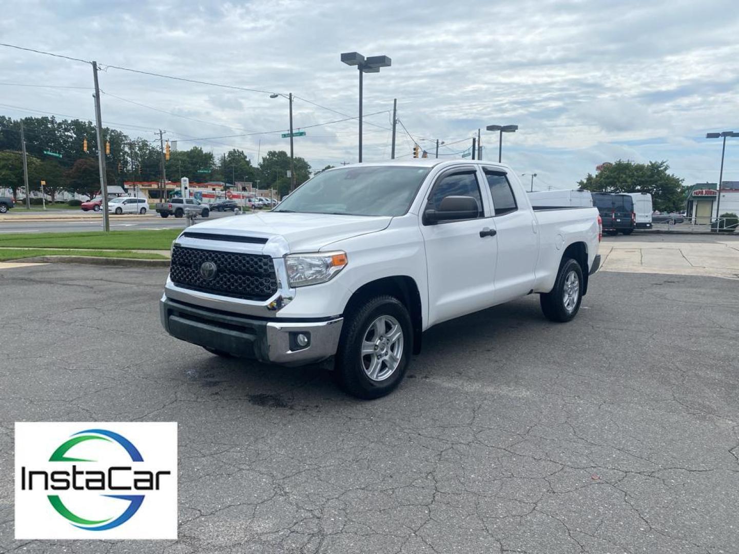 2018 Super White /Graphite Toyota Tundra SR (5TFRM5F1XJX) with an V8, 4.6L engine, 6-speed automatic transmission, located at 6520 E. Independence Blvd., Charlotte, NC, 28212, 35.146019, -80.723465 - Experience the perfect blend of power, reliability, and modern technology with this remarkable 2018 Toyota Tundra! A true workhorse on the road, this Toyota Tundra is powered by a robust V8, 4.6L engine that delivers impressive performance and towing capability, ensuring you conquer any challenge wi - Photo#8