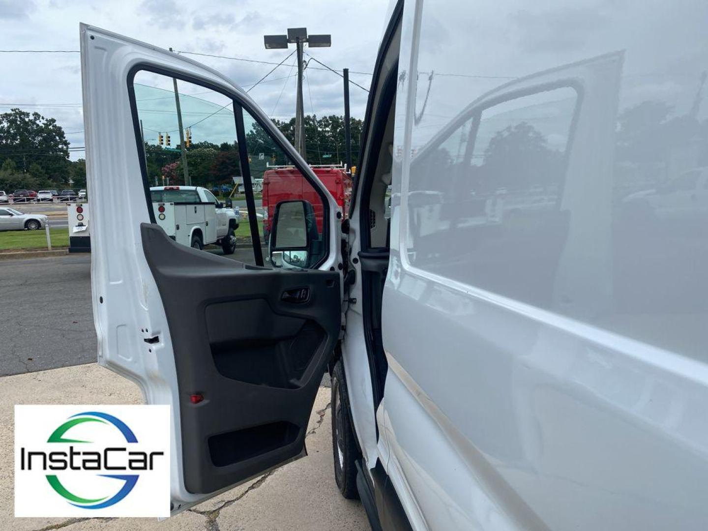 2023 Oxford White /Dark Palazzo Gray Ford Transit Van Base (1FTBR1C87PK) with an V6, 3.5L engine, 10-speed automatic transmission, located at 6520 E. Independence Blvd., Charlotte, NC, 28212, 35.146019, -80.723465 - <b>Equipment</b><br>See what's behind you with the back up camera on this vehicle. This vehicle offers Android Auto for seamless smartphone integration. This model offers Apple CarPlay for seamless connectivity. This vehicle features a hands-free Bluetooth phone system. The rear parking assist techn - Photo#18