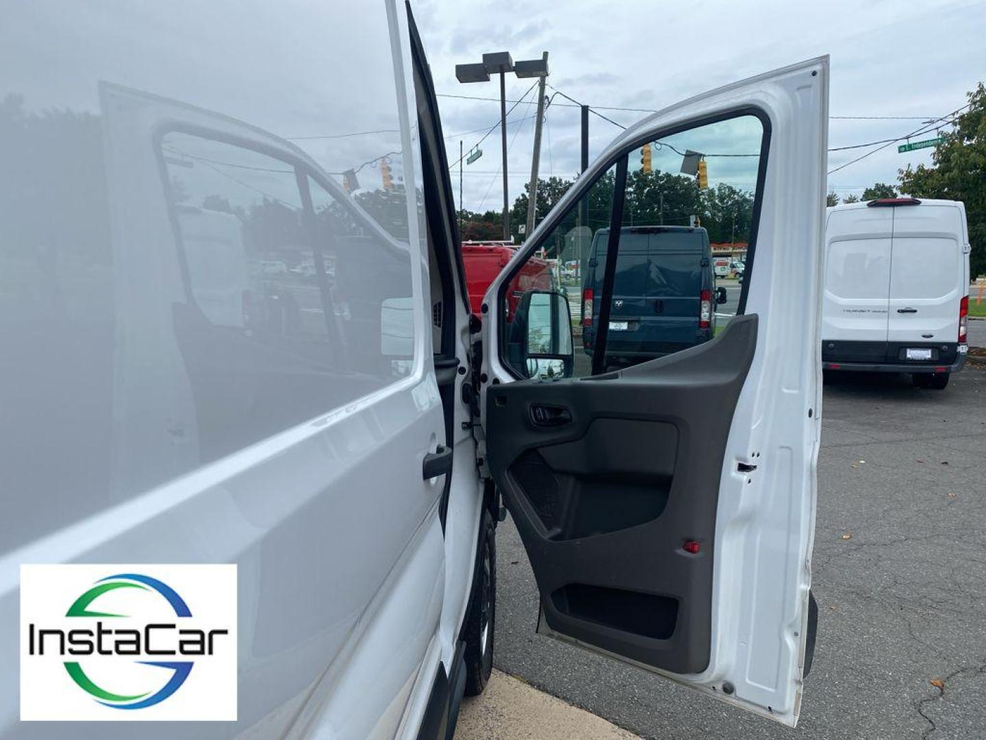 2023 Oxford White /Dark Palazzo Gray Ford Transit Van Base (1FTBR1C87PK) with an V6, 3.5L engine, 10-speed automatic transmission, located at 6520 E. Independence Blvd., Charlotte, NC, 28212, 35.146019, -80.723465 - <b>Equipment</b><br>See what's behind you with the back up camera on this vehicle. This vehicle offers Android Auto for seamless smartphone integration. This model offers Apple CarPlay for seamless connectivity. This vehicle features a hands-free Bluetooth phone system. The rear parking assist techn - Photo#20