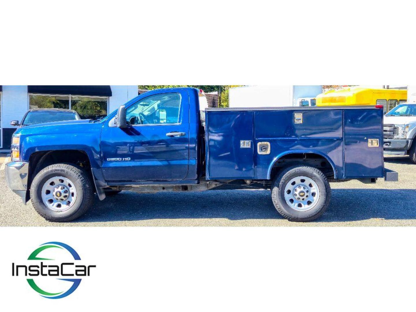 2015 Blue /Dark Ash/Jet Black Chevrolet Silverado Work Truck (1GB0CUEG2FZ) with an V8, 6.0L engine, 6-speed automatic transmission, located at 6520 E. Independence Blvd., Charlotte, NC, 28212, 35.146019, -80.723465 - <b>Equipment</b><br>This 3/4 ton pickup has a V8, 6.0L high output engine. Enjoy the incredible handling with the rear wheel drive on this 3/4 ton pickup. Maintaining a stable interior temperature in this 3/4 ton pickup is easy with the climate control system. Anti-lock brakes are standard on it. Wi - Photo#3