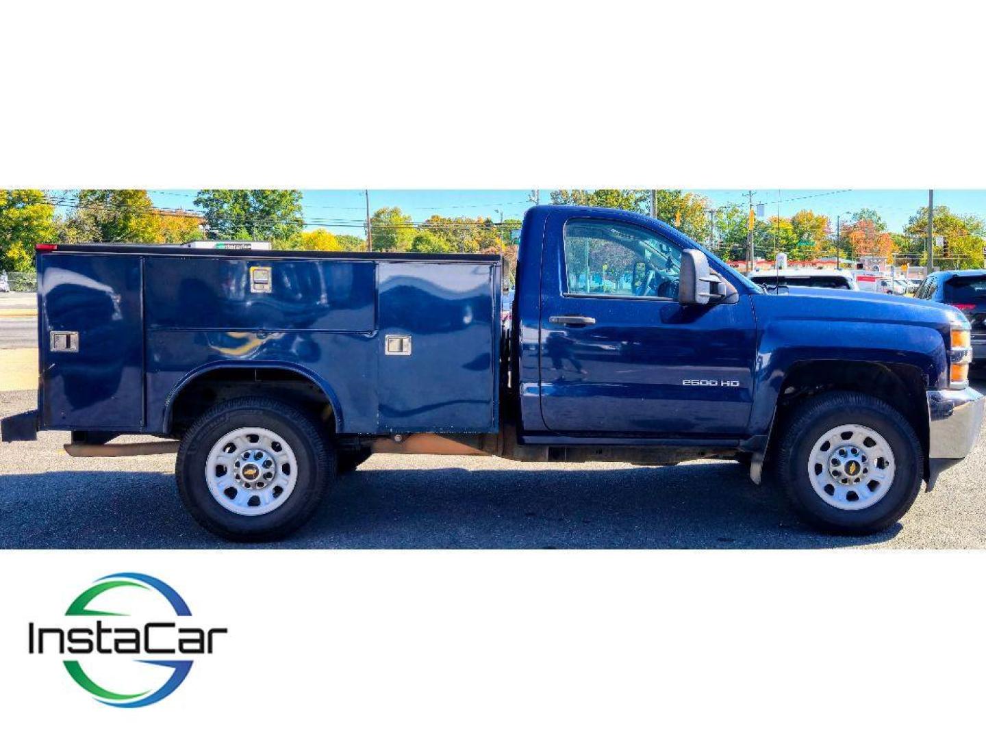 2015 Blue /Dark Ash/Jet Black Chevrolet Silverado Work Truck (1GB0CUEG2FZ) with an V8, 6.0L engine, 6-speed automatic transmission, located at 6520 E. Independence Blvd., Charlotte, NC, 28212, 35.146019, -80.723465 - <b>Equipment</b><br>This 3/4 ton pickup has a V8, 6.0L high output engine. Enjoy the incredible handling with the rear wheel drive on this 3/4 ton pickup. Maintaining a stable interior temperature in this 3/4 ton pickup is easy with the climate control system. Anti-lock brakes are standard on it. Wi - Photo#4