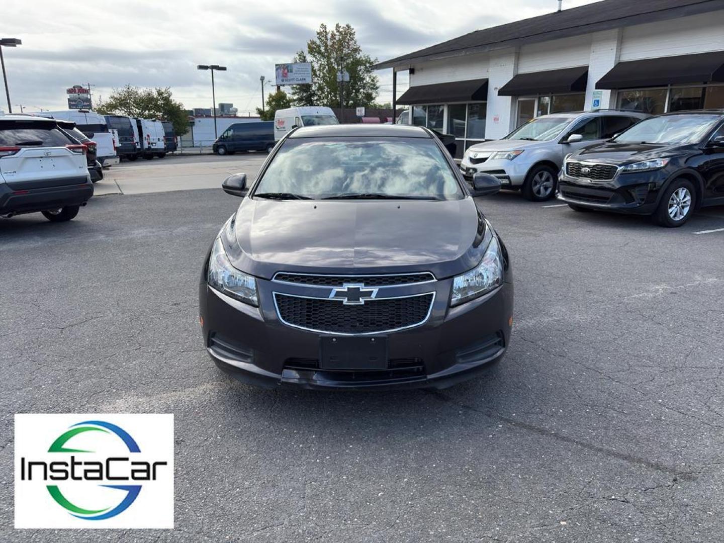 2014 Tungsten Metallic /Jet Black Chevrolet Cruze LT (1G1PK5SB4E7) with an 4 Cyl, 1.4L engine, 6-speed automatic transmission, located at 6520 E. Independence Blvd., Charlotte, NC, 28212, 35.146019, -80.723465 - <b>Equipment</b><br>With the keyless entry system on this Chevrolet Cruze you can pop the trunk without dropping your bags from the store. This vehicle emanates grace with its stylish gray exterior. Front wheel drive on this 2014 Chevrolet Cruze gives you better traction and better fuel economy. Th - Photo#5