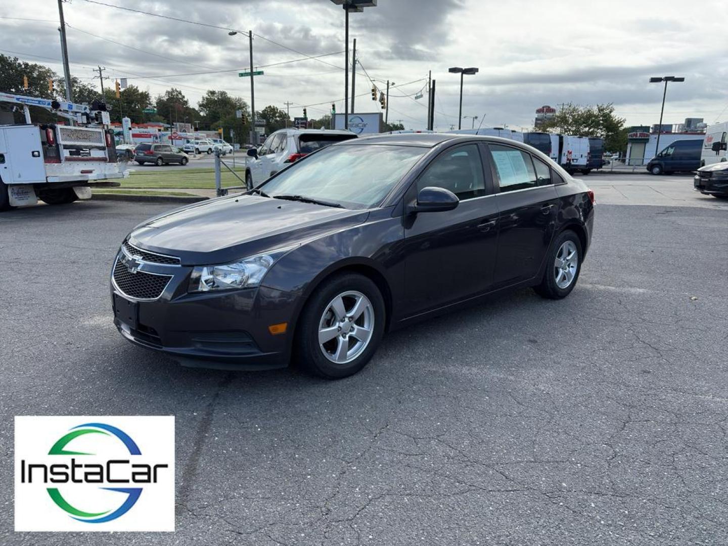 2014 Tungsten Metallic /Jet Black Chevrolet Cruze LT (1G1PK5SB4E7) with an 4 Cyl, 1.4L engine, 6-speed automatic transmission, located at 6520 E. Independence Blvd., Charlotte, NC, 28212, 35.146019, -80.723465 - <b>Equipment</b><br>With the keyless entry system on this Chevrolet Cruze you can pop the trunk without dropping your bags from the store. This vehicle emanates grace with its stylish gray exterior. Front wheel drive on this 2014 Chevrolet Cruze gives you better traction and better fuel economy. Th - Photo#6