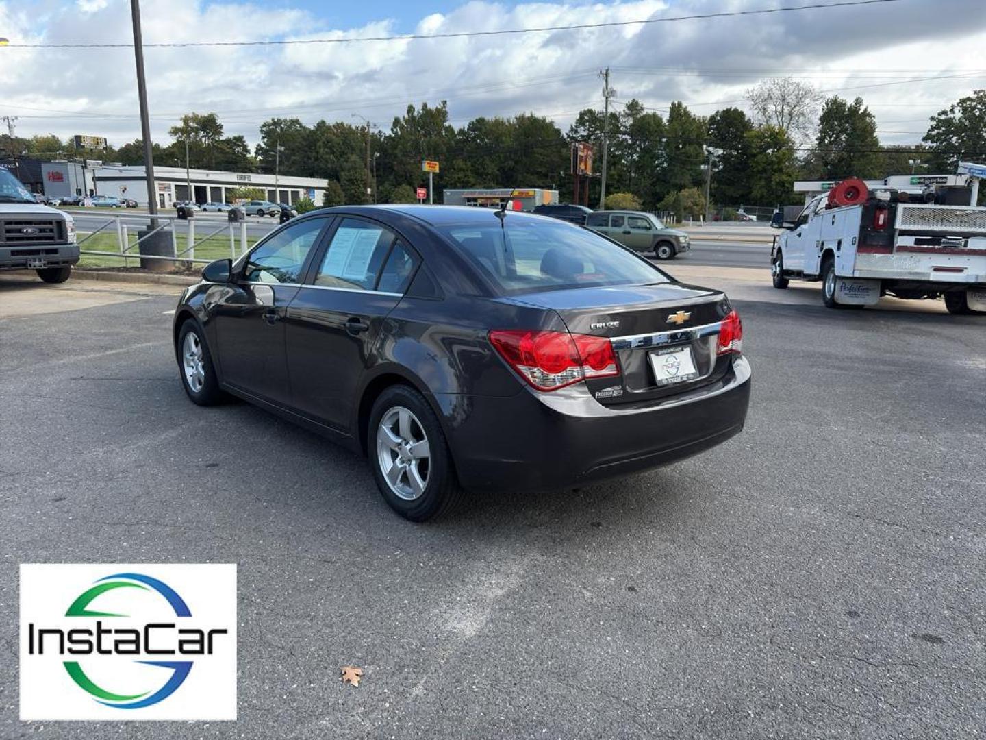 2014 Tungsten Metallic /Jet Black Chevrolet Cruze LT (1G1PK5SB4E7) with an 4 Cyl, 1.4L engine, 6-speed automatic transmission, located at 6520 E. Independence Blvd., Charlotte, NC, 28212, 35.146019, -80.723465 - <b>Equipment</b><br>With the keyless entry system on this Chevrolet Cruze you can pop the trunk without dropping your bags from the store. This vehicle emanates grace with its stylish gray exterior. Front wheel drive on this 2014 Chevrolet Cruze gives you better traction and better fuel economy. Th - Photo#8