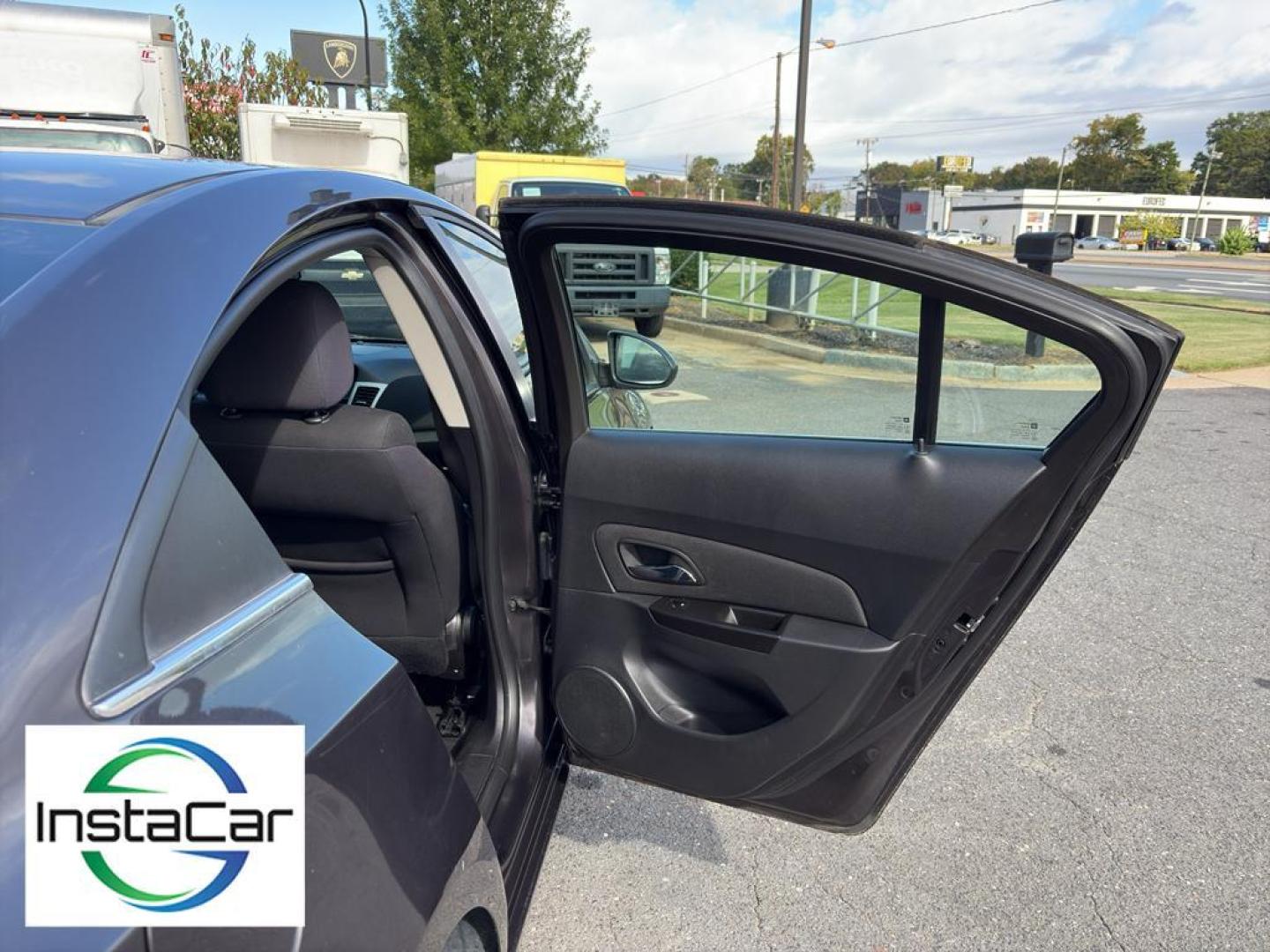 2014 Tungsten Metallic /Jet Black Chevrolet Cruze LT (1G1PK5SB4E7) with an 4 Cyl, 1.4L engine, 6-speed automatic transmission, located at 6520 E. Independence Blvd., Charlotte, NC, 28212, 35.146019, -80.723465 - <b>Equipment</b><br>With the keyless entry system on this Chevrolet Cruze you can pop the trunk without dropping your bags from the store. This vehicle emanates grace with its stylish gray exterior. Front wheel drive on this 2014 Chevrolet Cruze gives you better traction and better fuel economy. Th - Photo#19