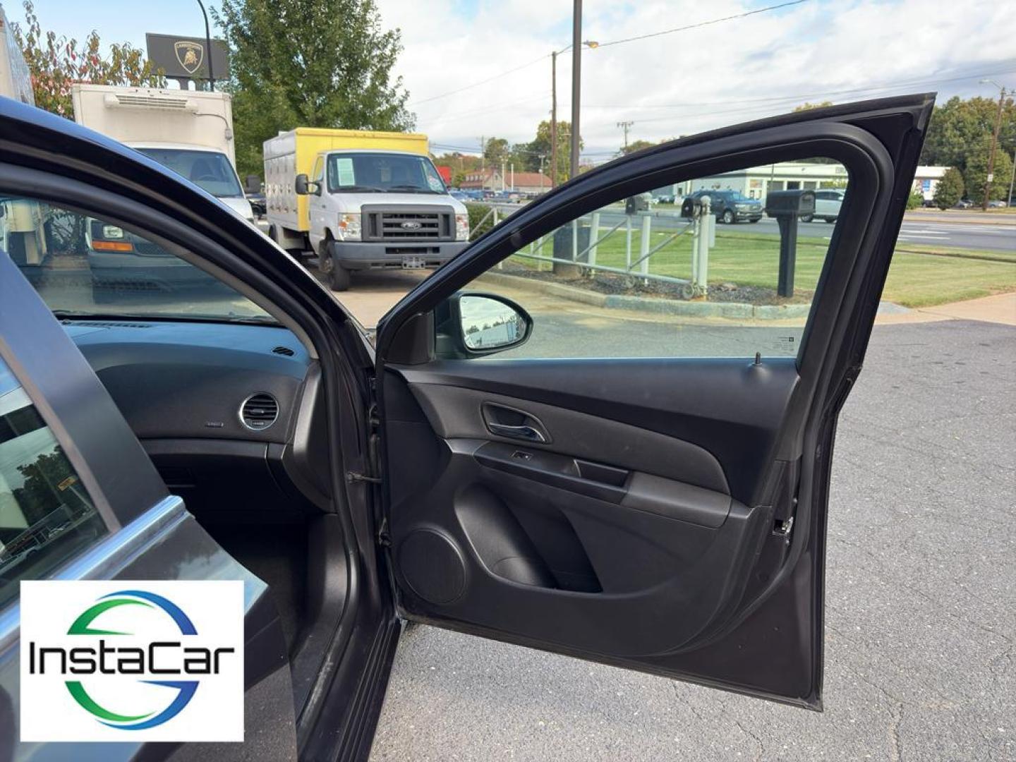 2014 Tungsten Metallic /Jet Black Chevrolet Cruze LT (1G1PK5SB4E7) with an 4 Cyl, 1.4L engine, 6-speed automatic transmission, located at 6520 E. Independence Blvd., Charlotte, NC, 28212, 35.146019, -80.723465 - <b>Equipment</b><br>With the keyless entry system on this Chevrolet Cruze you can pop the trunk without dropping your bags from the store. This vehicle emanates grace with its stylish gray exterior. Front wheel drive on this 2014 Chevrolet Cruze gives you better traction and better fuel economy. Th - Photo#20