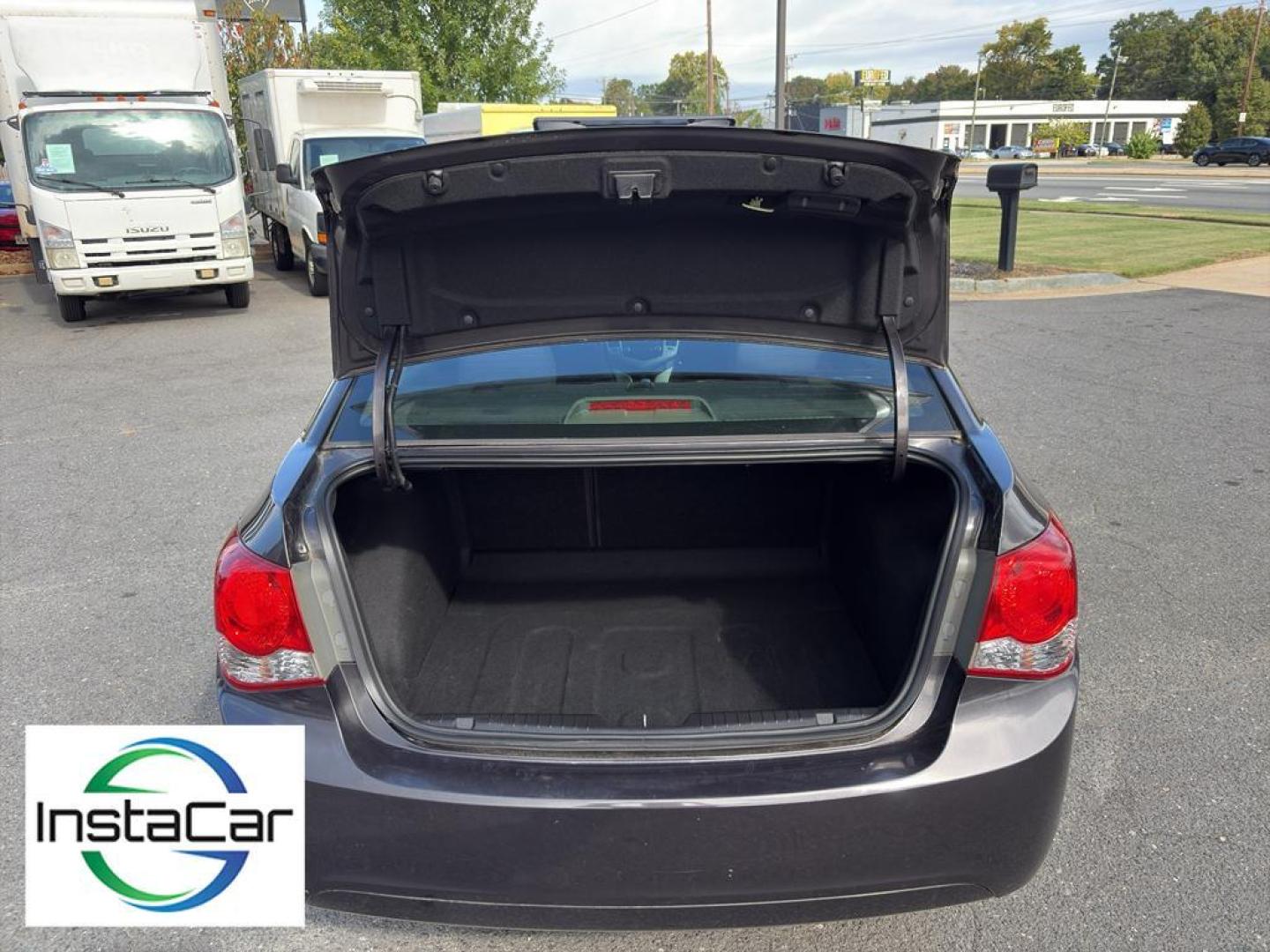 2014 Tungsten Metallic /Jet Black Chevrolet Cruze LT (1G1PK5SB4E7) with an 4 Cyl, 1.4L engine, 6-speed automatic transmission, located at 6520 E. Independence Blvd., Charlotte, NC, 28212, 35.146019, -80.723465 - <b>Equipment</b><br>With the keyless entry system on this Chevrolet Cruze you can pop the trunk without dropping your bags from the store. This vehicle emanates grace with its stylish gray exterior. Front wheel drive on this 2014 Chevrolet Cruze gives you better traction and better fuel economy. Th - Photo#27