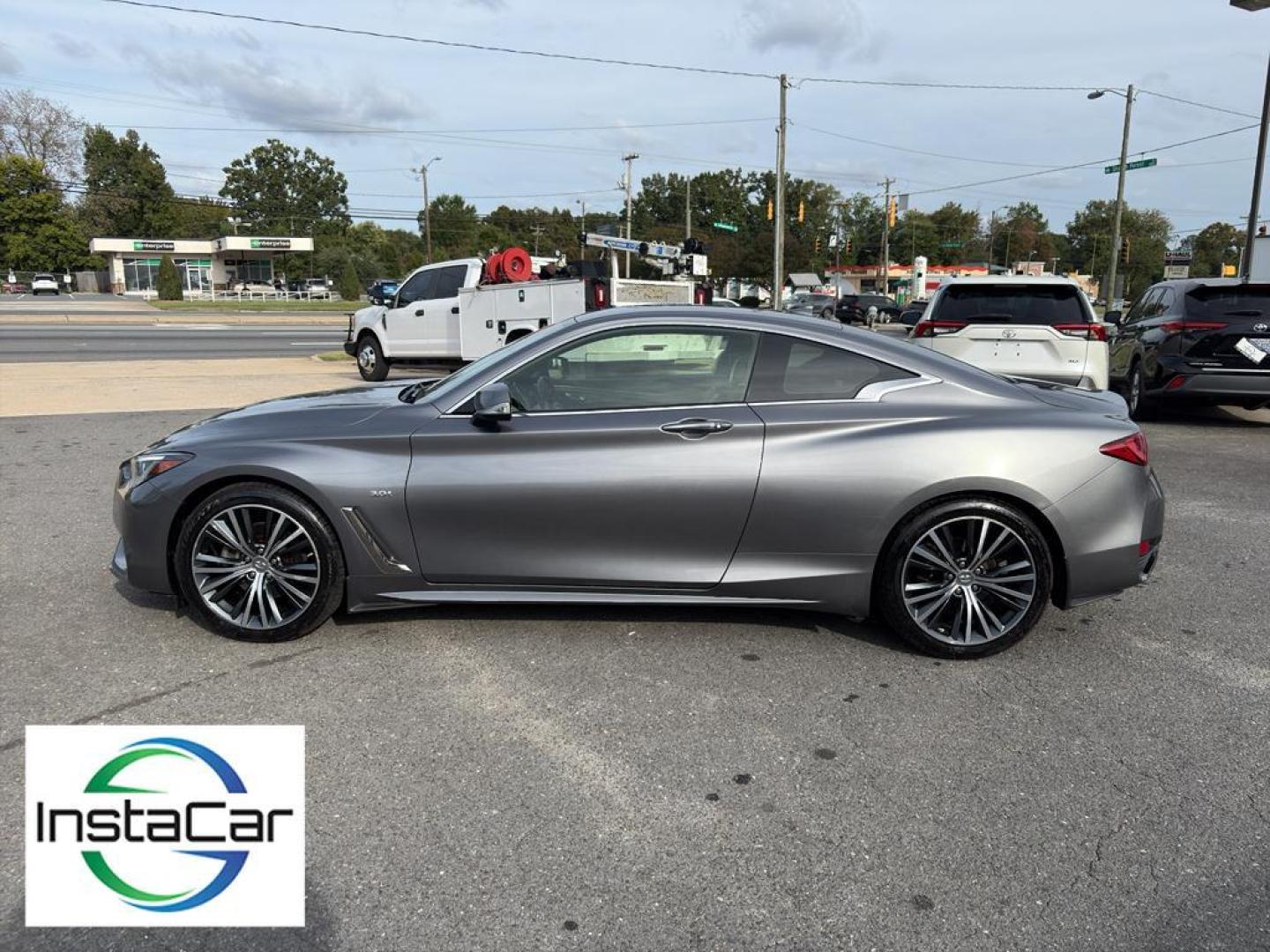 2017 Graphite Shadow /Graphite INFINITI Q60 3.0t Premium (JN1EV7EL3HM) with an V6, 3.0L engine, 7-speed automatic transmission, located at 6520 E. Independence Blvd., Charlotte, NC, 28212, 35.146019, -80.723465 - <b>Equipment</b><br>Bluetooth technology is built into this unit, keeping your hands on the steering wheel and your focus on the road. Engulf yourself with the crystal clear sound of a BOSE sound system in it. This INFINITI Q60 offers Automatic Climate Control for personalized comfort. The premium - Photo#11