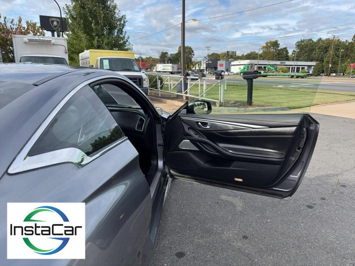2017 Graphite Shadow /Graphite INFINITI Q60 3.0t Premium (JN1EV7EL3HM) with an V6, 3.0L engine, 7-speed automatic transmission, located at 6520 E. Independence Blvd., Charlotte, NC, 28212, 35.146019, -80.723465 - <b>Equipment</b><br>Bluetooth technology is built into this unit, keeping your hands on the steering wheel and your focus on the road. Engulf yourself with the crystal clear sound of a BOSE sound system in it. This INFINITI Q60 offers Automatic Climate Control for personalized comfort. The premium - Photo#22