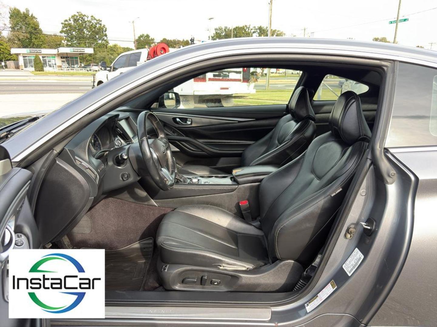 2017 Graphite Shadow /Graphite INFINITI Q60 3.0t Premium (JN1EV7EL3HM) with an V6, 3.0L engine, 7-speed automatic transmission, located at 6520 E. Independence Blvd., Charlotte, NC, 28212, 35.146019, -80.723465 - <b>Equipment</b><br>Bluetooth technology is built into this unit, keeping your hands on the steering wheel and your focus on the road. Engulf yourself with the crystal clear sound of a BOSE sound system in it. This INFINITI Q60 offers Automatic Climate Control for personalized comfort. The premium - Photo#23