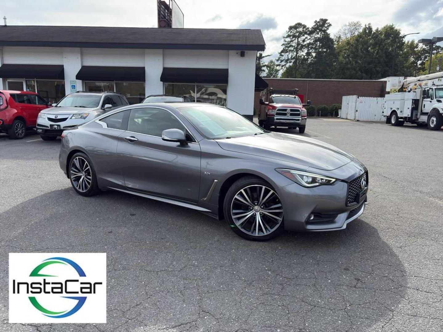 2017 Graphite Shadow /Graphite INFINITI Q60 3.0t Premium (JN1EV7EL3HM) with an V6, 3.0L engine, 7-speed automatic transmission, located at 6520 E. Independence Blvd., Charlotte, NC, 28212, 35.146019, -80.723465 - <b>Equipment</b><br>Bluetooth technology is built into this unit, keeping your hands on the steering wheel and your focus on the road. Engulf yourself with the crystal clear sound of a BOSE sound system in it. This INFINITI Q60 offers Automatic Climate Control for personalized comfort. The premium - Photo#1