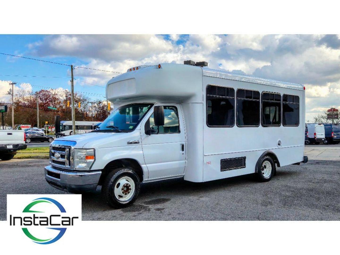 2014 Oxford White /Medium Flint Ford E-450 Super Duty Base (1FDFE4FS4ED) with an V10, 6.8L (415 CID) engine, 5-speed automatic transmission, located at 6520 E. Independence Blvd., Charlotte, NC, 28212, 35.146019, -80.723465 - <b>Equipment</b><br>Enjoy the incredible handling with the rear wheel drive on this unit. This unit shines with clean polished lines coated with an elegant white finish. The Ford E-450 Super Duty has a V10, 6.8L (415 CID) high output engine. Maintaining a stable interior temperature in this Ford E-4 - Photo#2